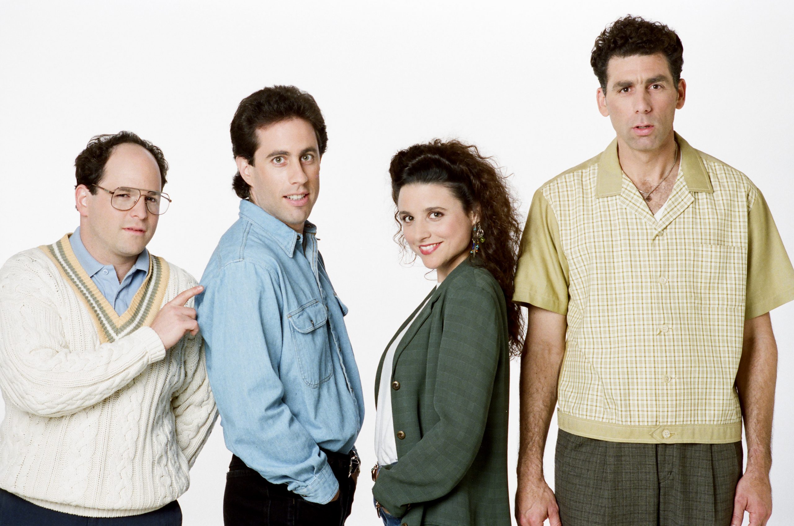Jason Alexander as George Costanza, Jerry Seinfeld as Jerry Seinfeld, Julia Louis-Dreyfus as Elaine Benes and Michael Richards as Cosmo Kramer pose for a promotional photo
