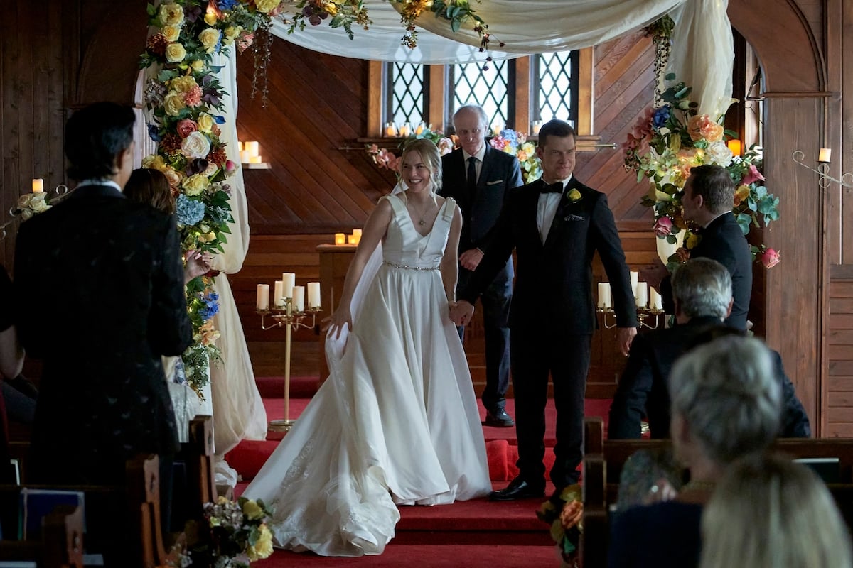 Shand and Oliver at the altar in 'Signed, Sealed, Delivered: The Vows We Have Made.'