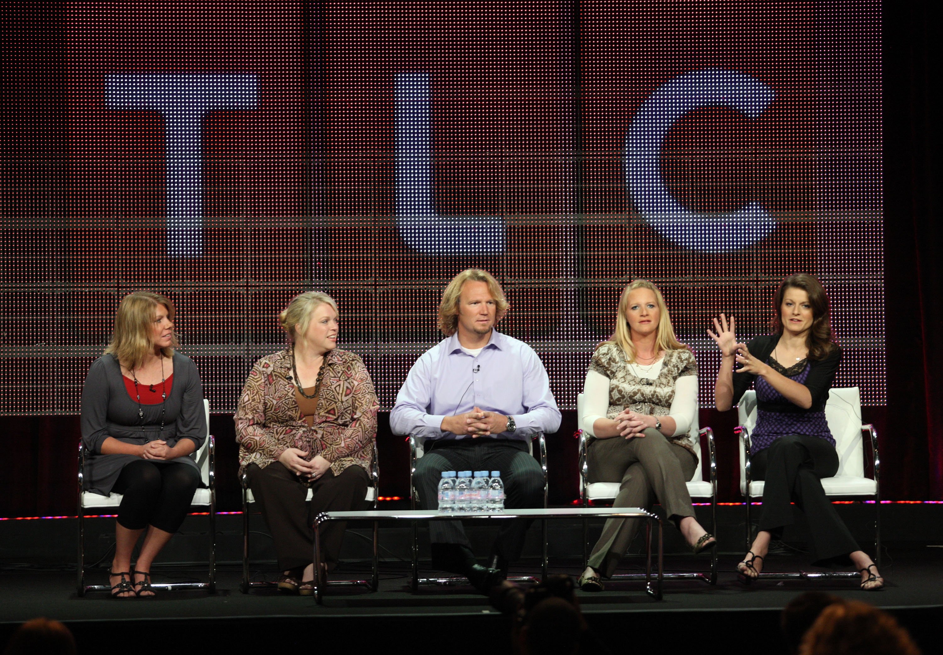 Meri Brown, Janelle Brown, Kody Brown, Christine Brown and Robyn Brown sit on stage at the 2010 Summer TCA Press Tour. Season 16 of Sister Wives will premiere in November 2021