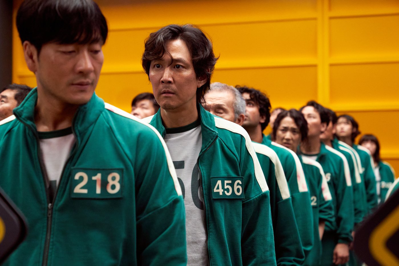 'Squid Game' cast members lining up in their track suits