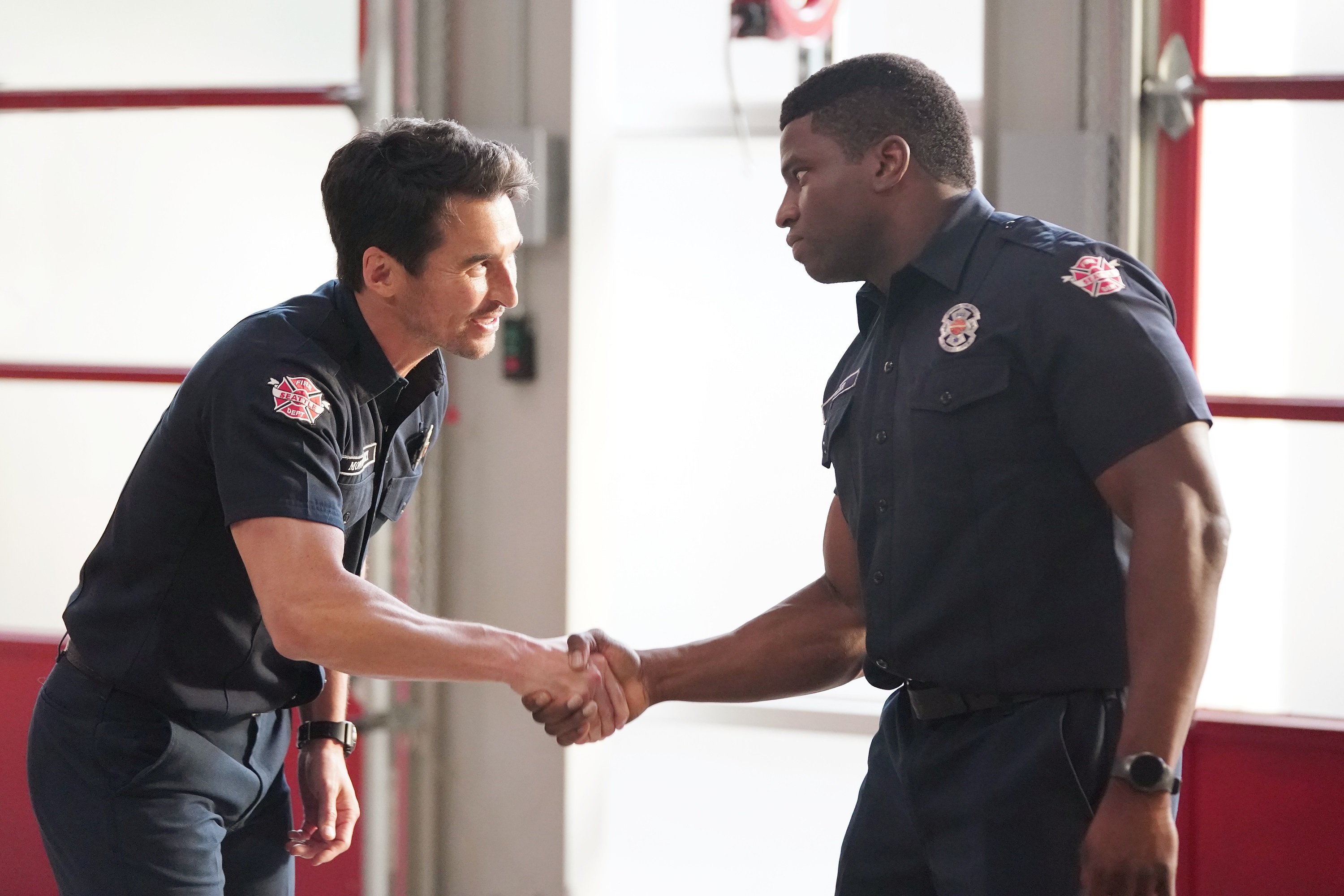 Station 19 Season 5 Episode 2 Jay Hayden and Okieriete Onaodowan shake hands