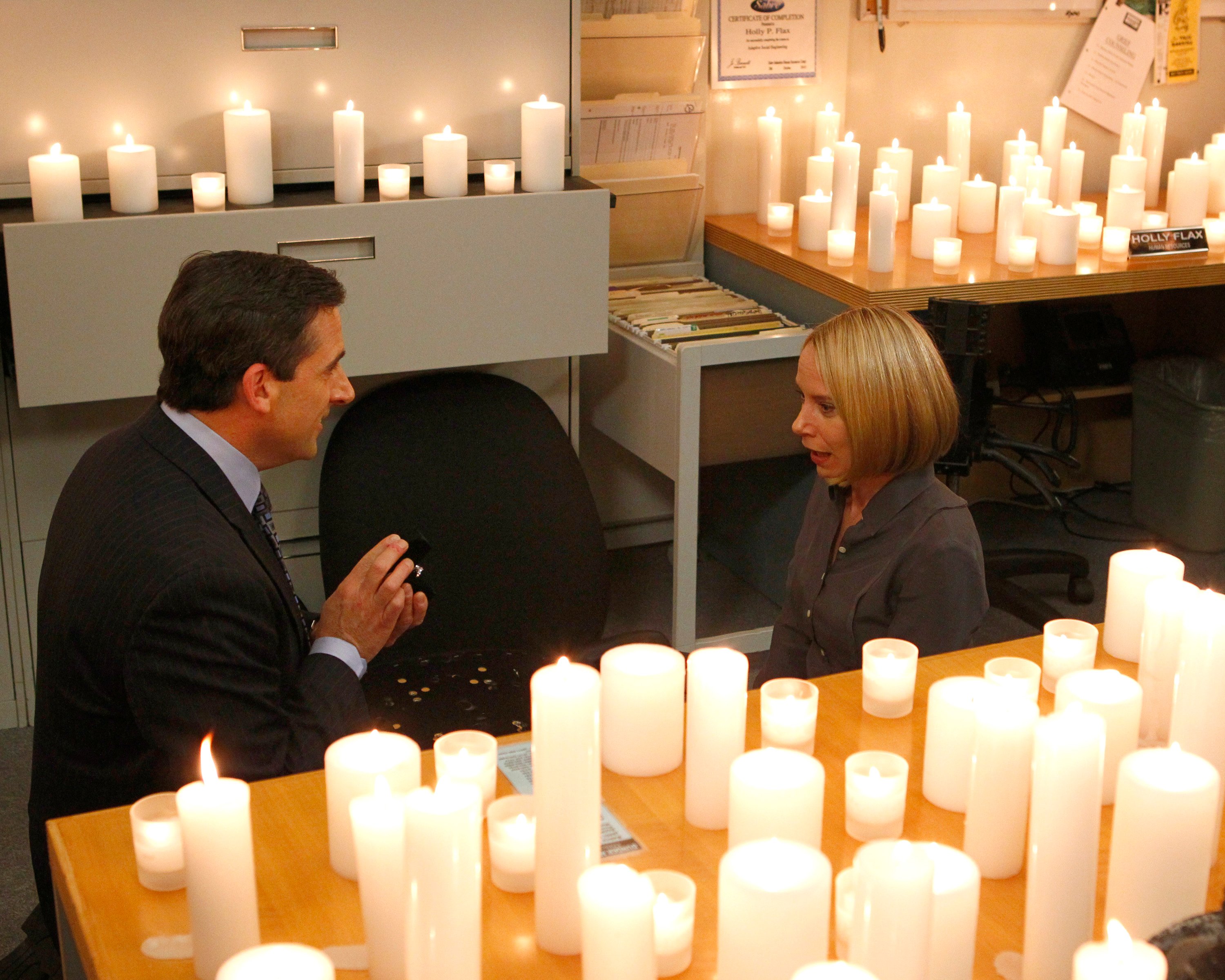 Michael Scott, played by Steve Carell, proposes to Holly Flax, played by Amy Ryan, in 'The Office'