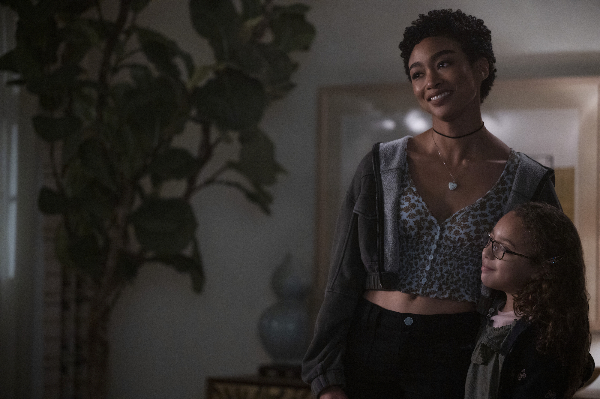 Tati Gabrielle, and Dallas Skye standing in a room in 'You' Season 3.