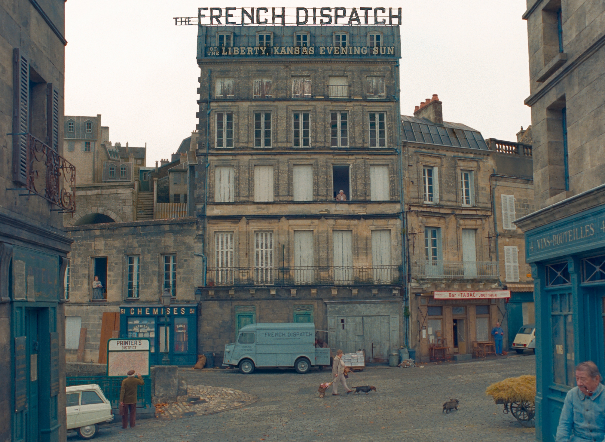 'The French Dispatch' exterior shot with a van in front