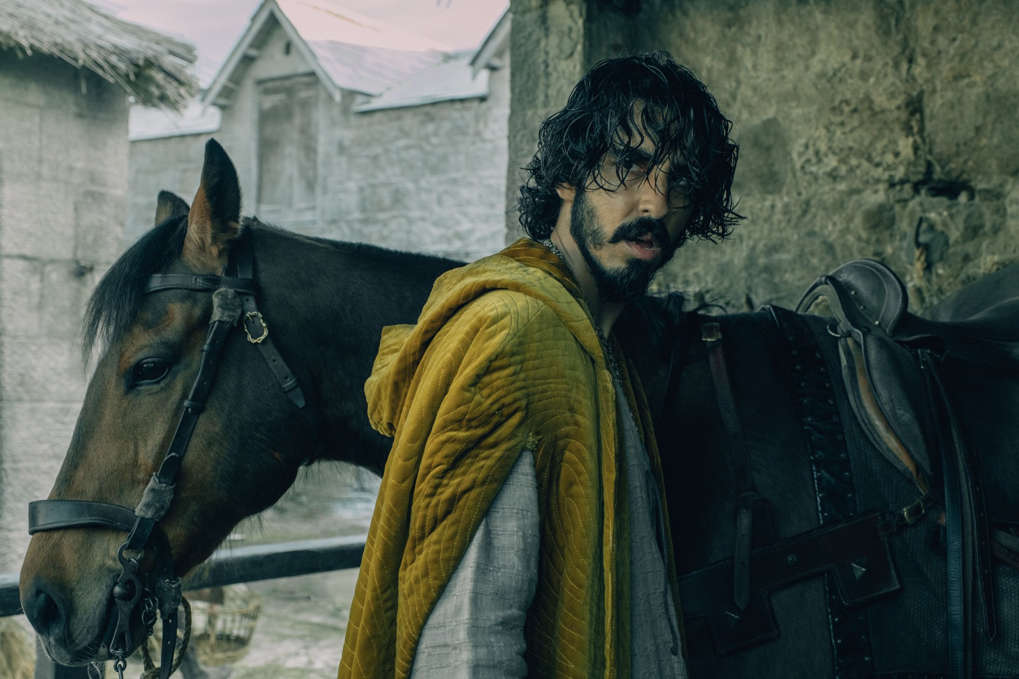 'The Green Knight' star Dev Patel turning in front of a horse