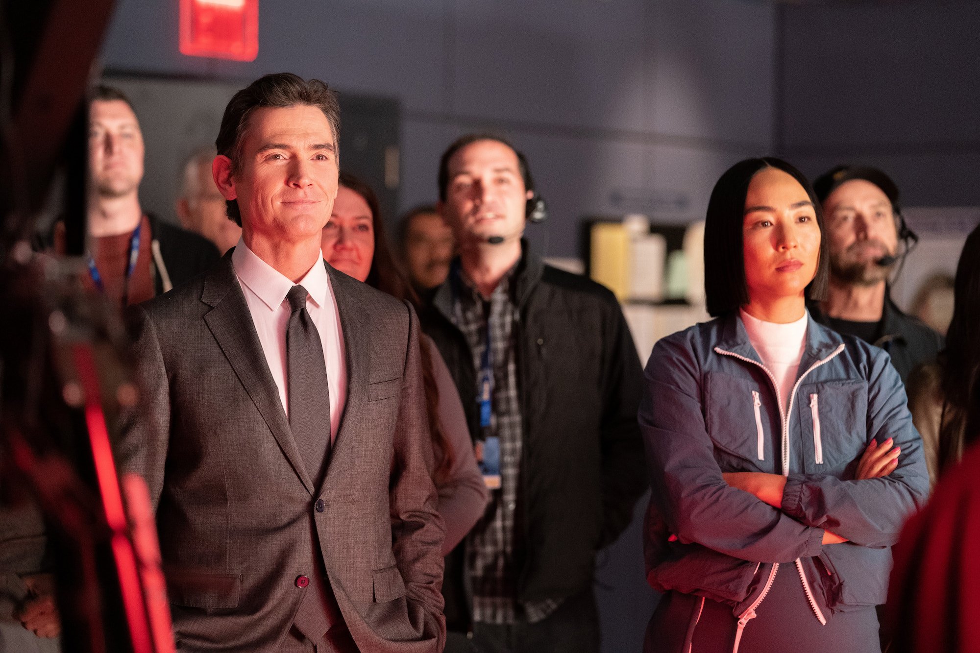 The Morning Show stars Billy Crudup and Greta Lee watch Foo Fighters perform