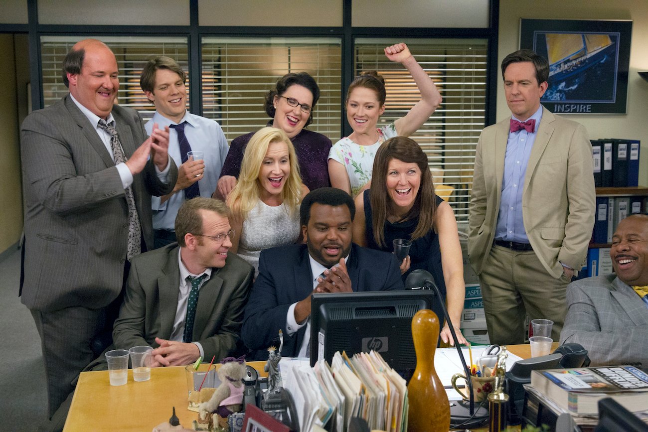 Brian Baumgartner as Kevin Malone, Jake Lacy as Pete, Paul Lieberstein as Toby Flenderson, Angela Kinsey as Angela Martin, Phyllis Smith as Phyllis Vance, Craig Robinson as Darryl Philbin, Ellie Kemper as Erin Hannon, Kate Flannery as Meredith Palmer, Ed Helms as Andy Bernard, Leslie David Baker as Stanley Hudson in one of the final photos from the set of 'The Office'