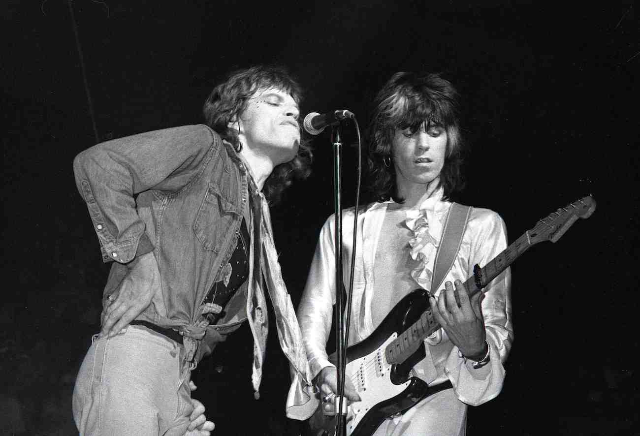 Mick Jagger and Keith Richards sharing a mic live in 1972.
