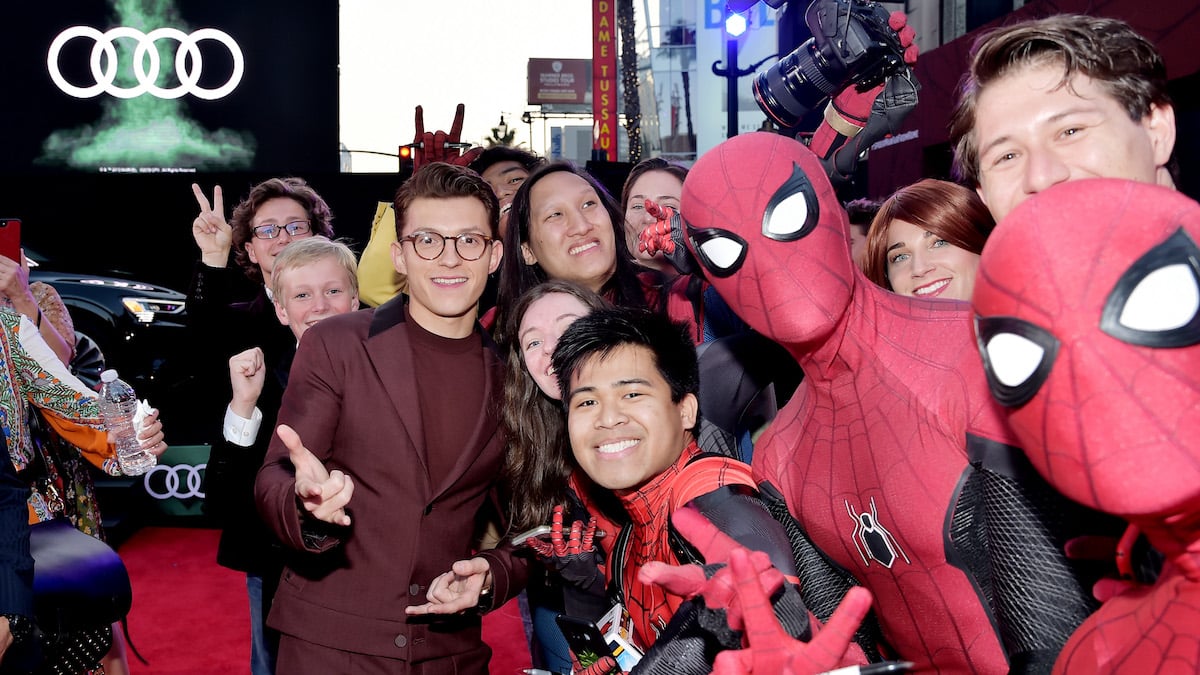 Tom Holland poses with fans at the world premiere of ‘Spider-Man: Far From Home’