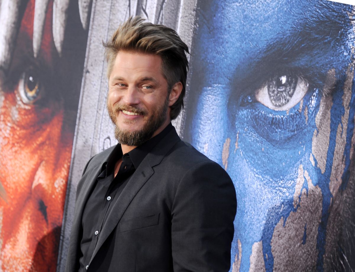 Travis Fimmel looking to the side and smiling
