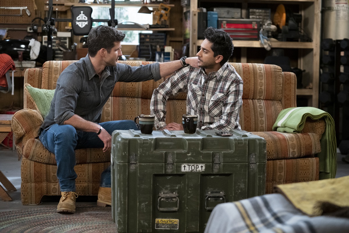Parker Young in a blue shirt and jeans, and Adhir Kalyan in a plaid shirt and jeans in a scene from 'United States of Al.'