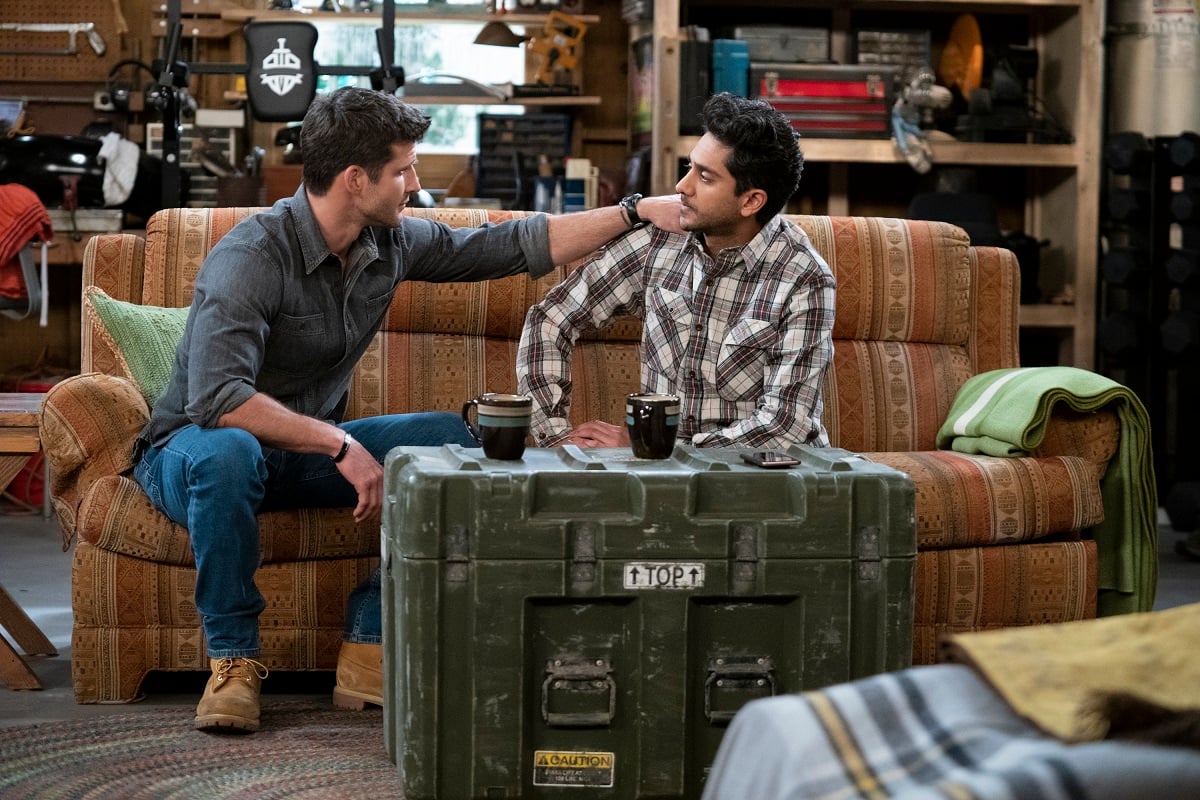 Parker Young in a blue shirt and jeans, and Adhir Kalyan in a plaid shirt and jeans in a scene from 'United States of Al.'