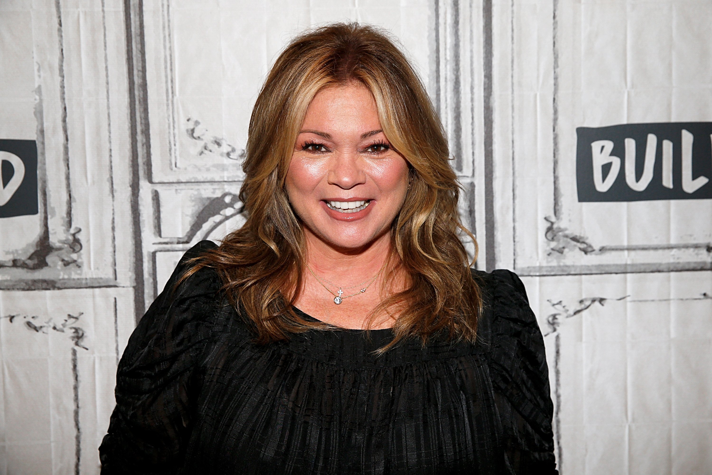 Valerie Bertinelli poses in a black outfit