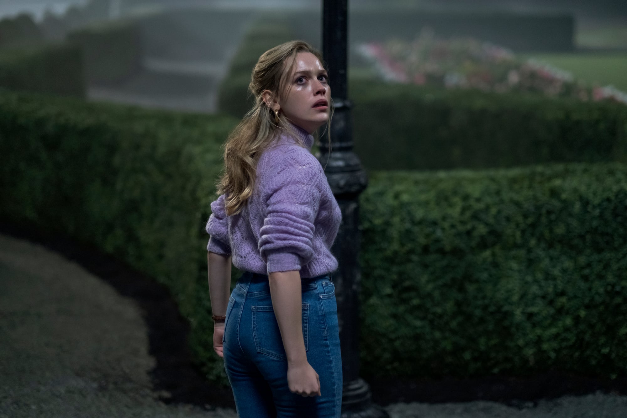 Victoria Pedretti standing outside of Bly Manor in 'The Haunting of Bly Manor'