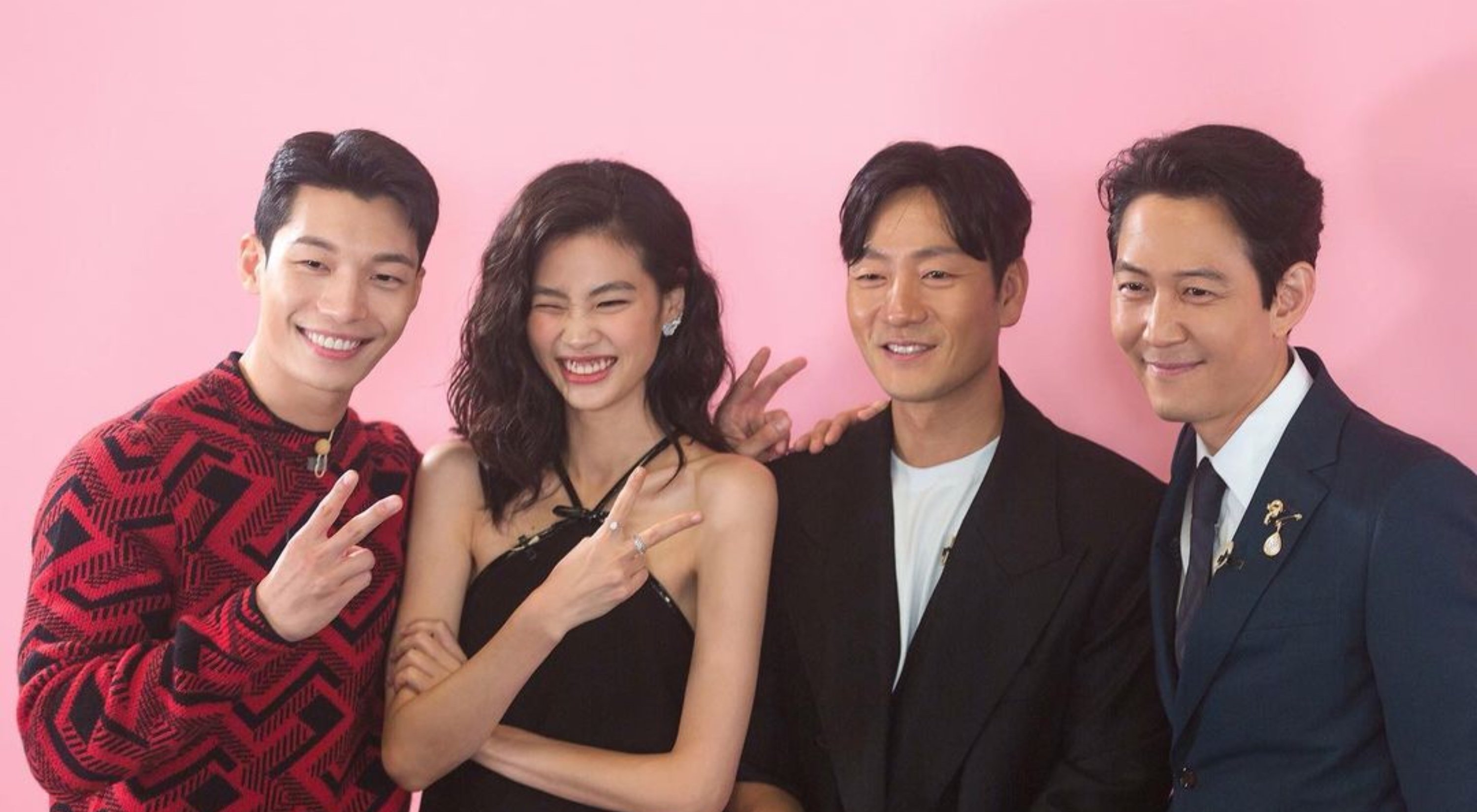 Wi Ha-Joon, HoYeon Jung, Park Hae-Soo and Lee Jung-Jae for 'Squid Game' Netflix K-drama wearing suits and red sweater