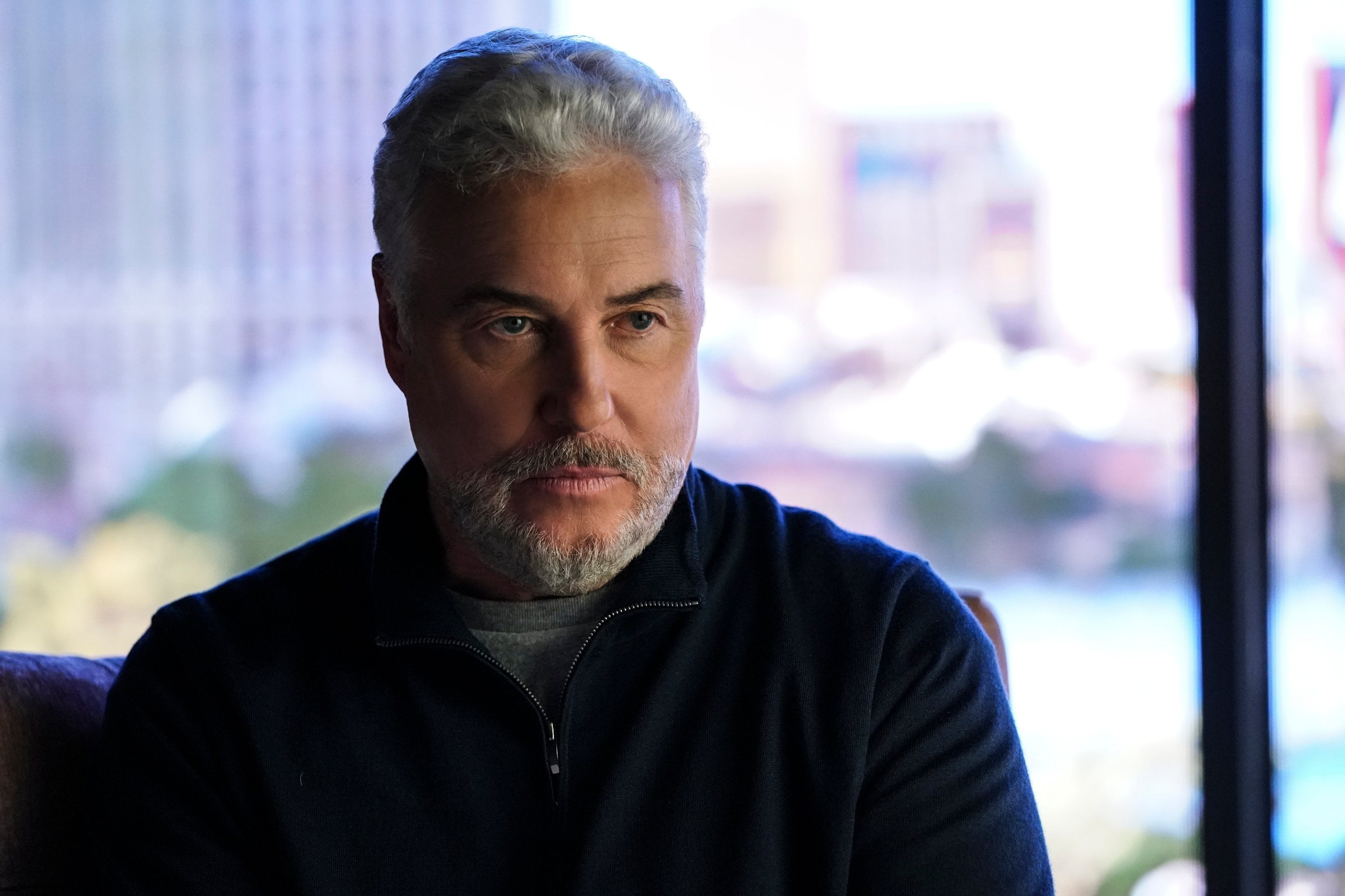 'CSI: Vegas' actor William Petersen in a black shirt in a scene from the CBS series.