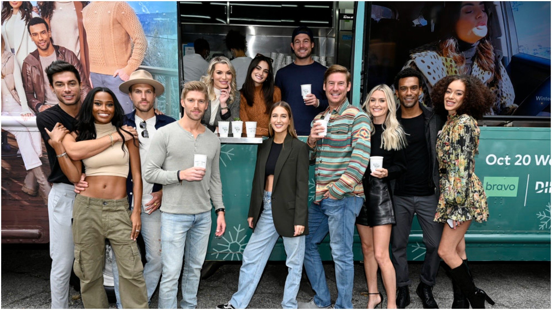 The cast of Bravo's new show 'Winter House' standing in front of a food and beverage truck