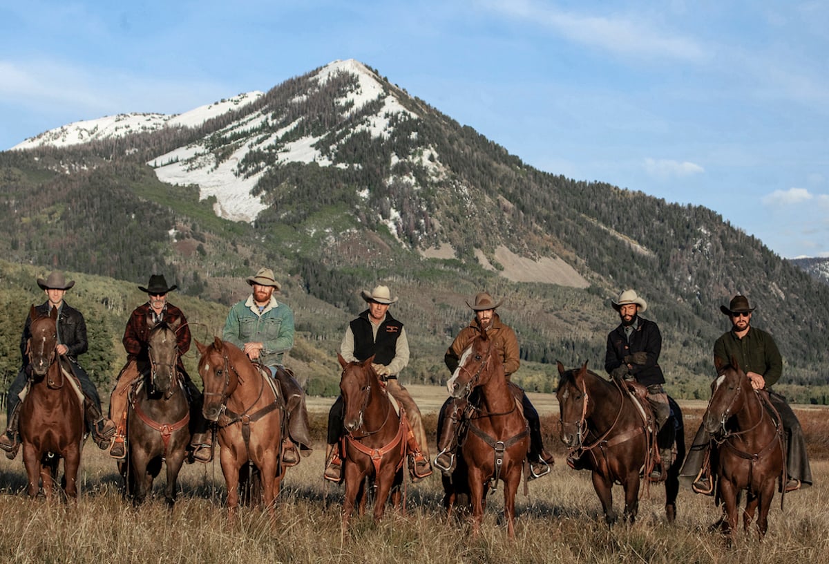 Yellowstone cast: Dutton Ranch owner John Dutton (center, played by Kevin Costner) is surrounded by his ranch team, Jamie Dutton (Wes Bentley, left), Lloyd (Forrie Smith), Fred (Luke Peckinpah), Lee Dutton (Dave Annable), Colby (Denim Richards) and Rip Wheeler (Cole Hauser)