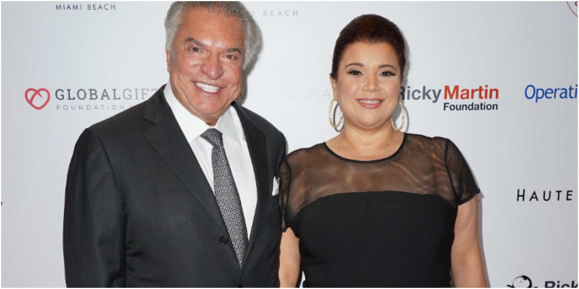 Al Cardenas and Ana Navarro pose for a red carpet photograph.