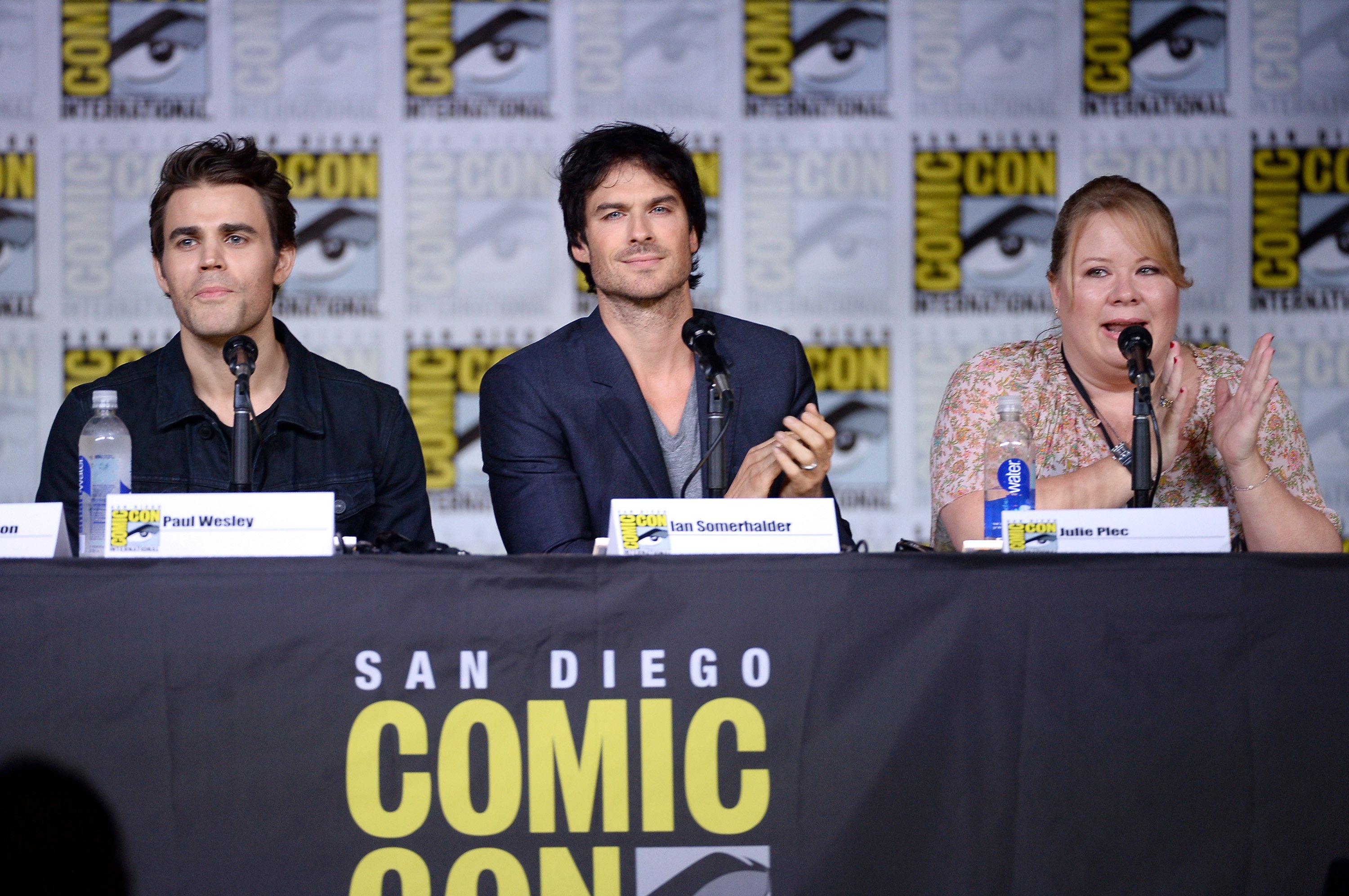 Paul Wesley and Ian Somerhalder and writer/producer Julie Plec for 'The Vampire Diaries' sitting at Comic Con panel table