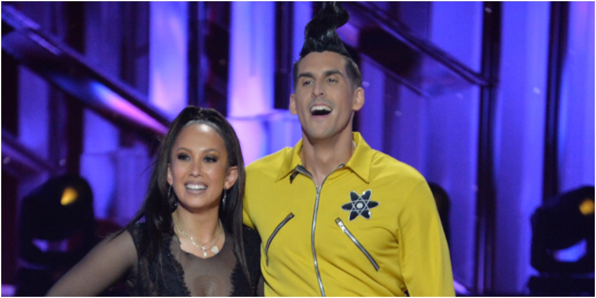 cheryl burke and cody rigsby wait for their scores on DWTS