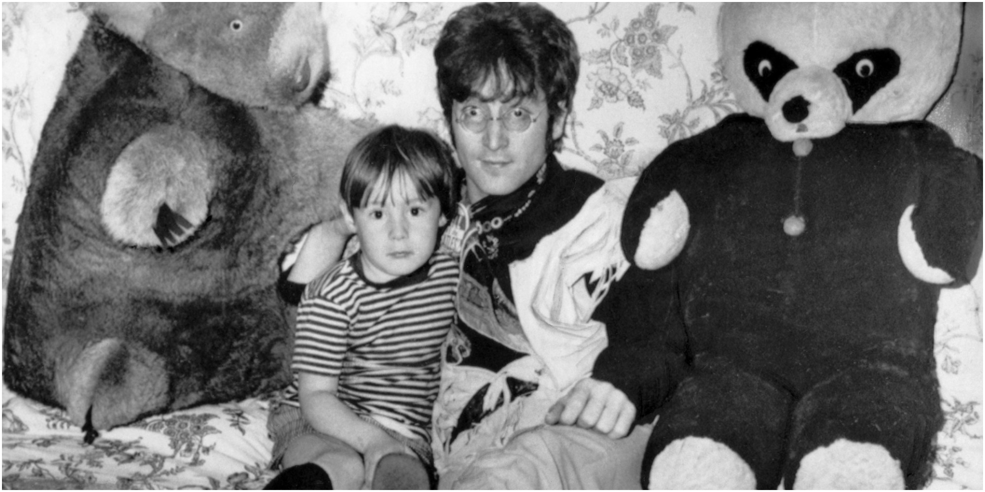 Julian and John Lennon pose for a photograph.