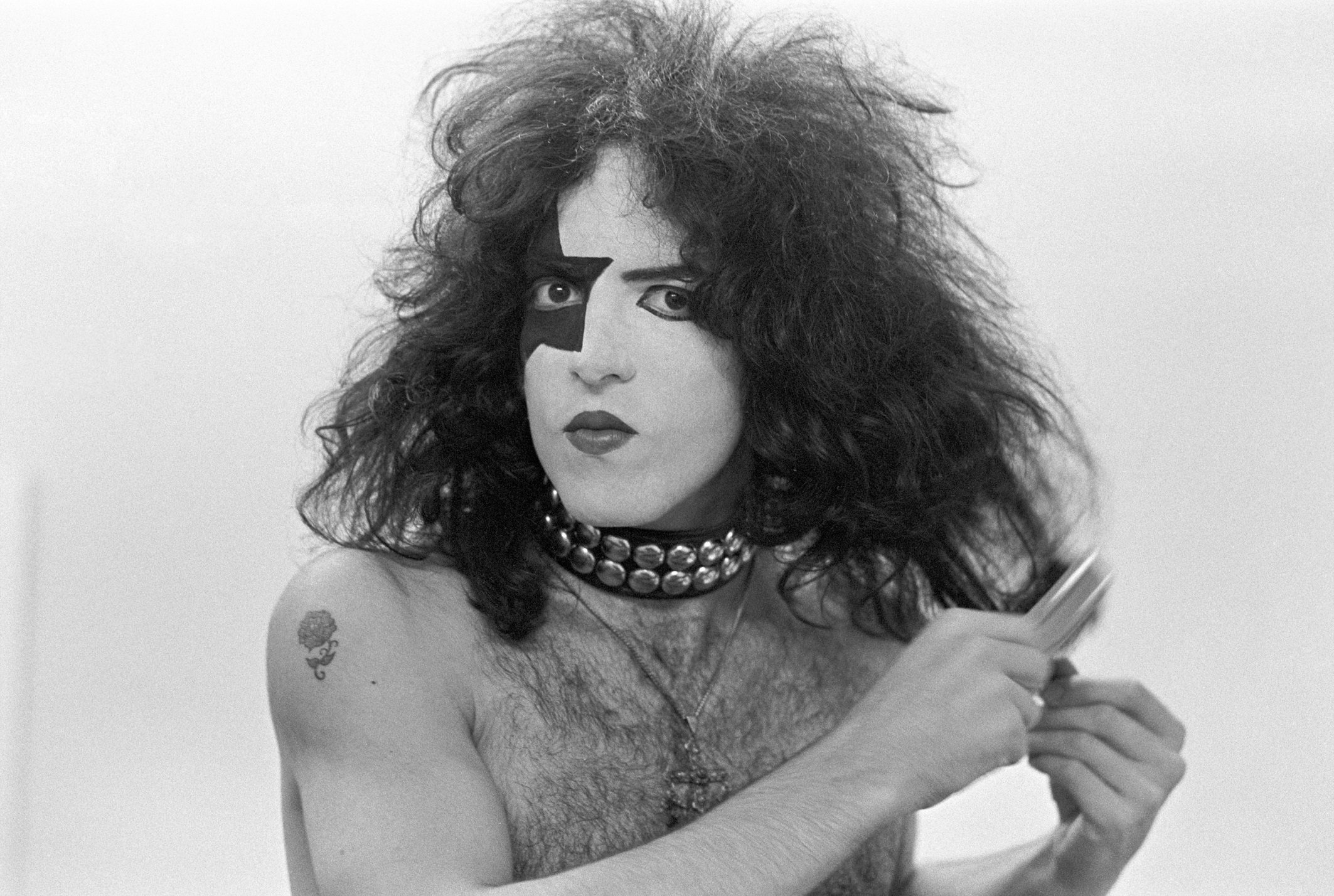 Paul Stanley of Kiss with a hair brush