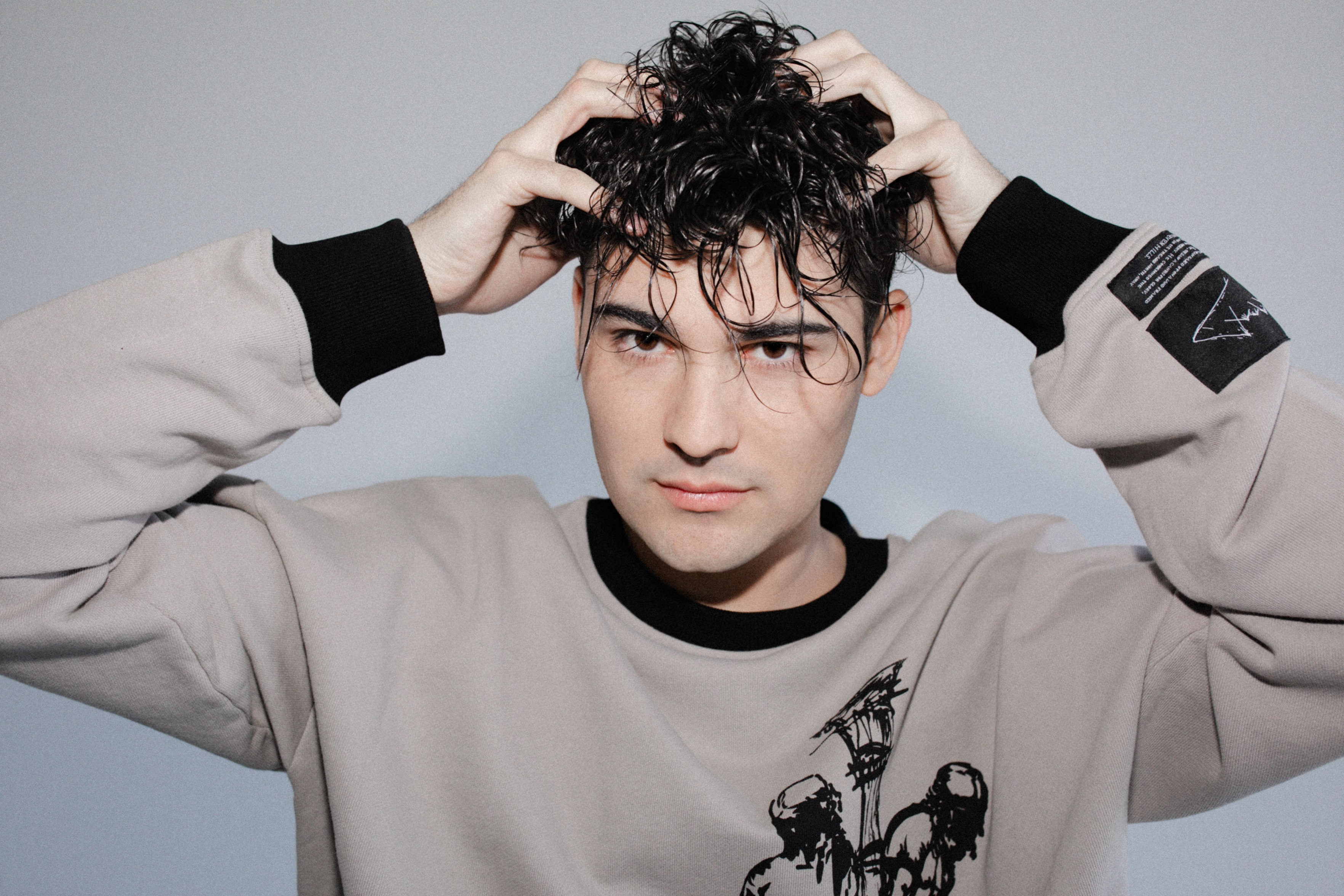 Lorenzo Doryon putting his hands on his head