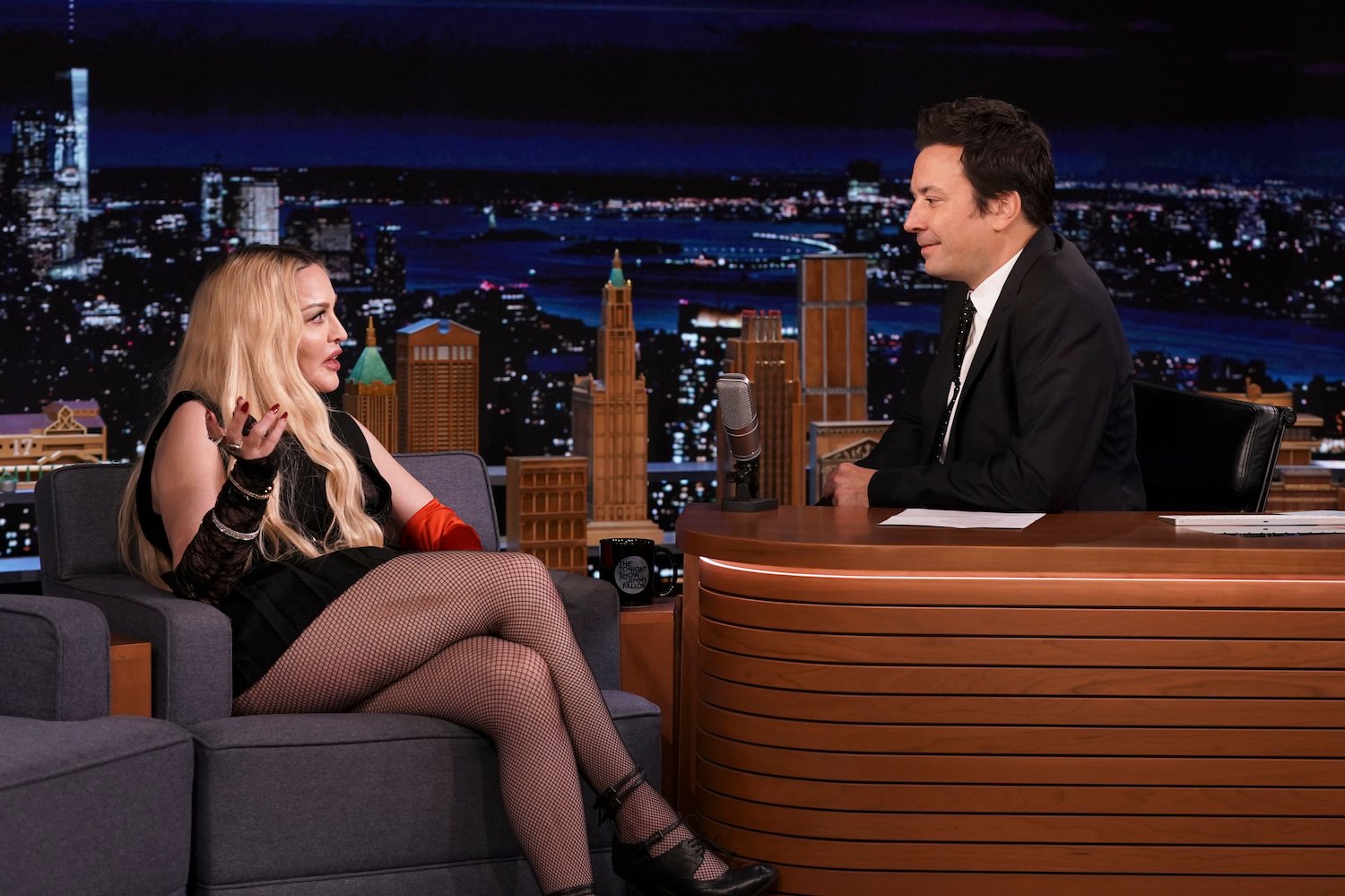 Madonna wears all black and one red glove during an interview with Jimmy Fallon on 'The Tonight Show' Starring Jimmy Fallon'