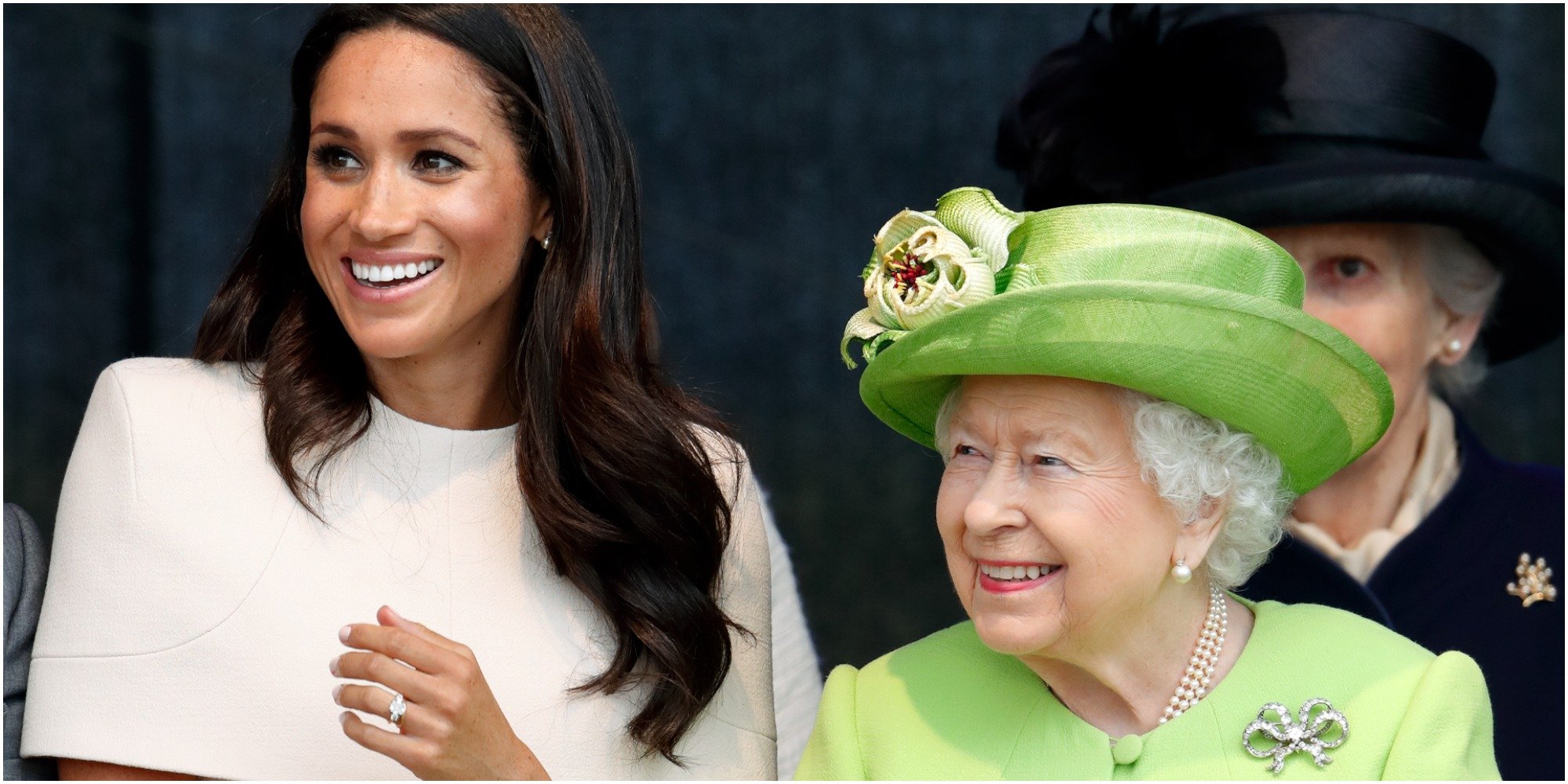 Meghan Markle and Queen Elizabeth smile for the cameras in a candid shot.