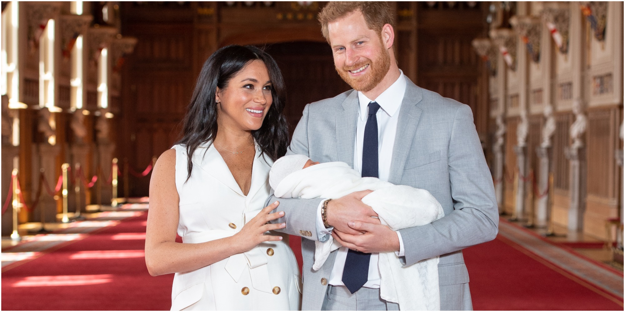 Prince Harry and Meghan Markle hold Archie after his 2019 birth.