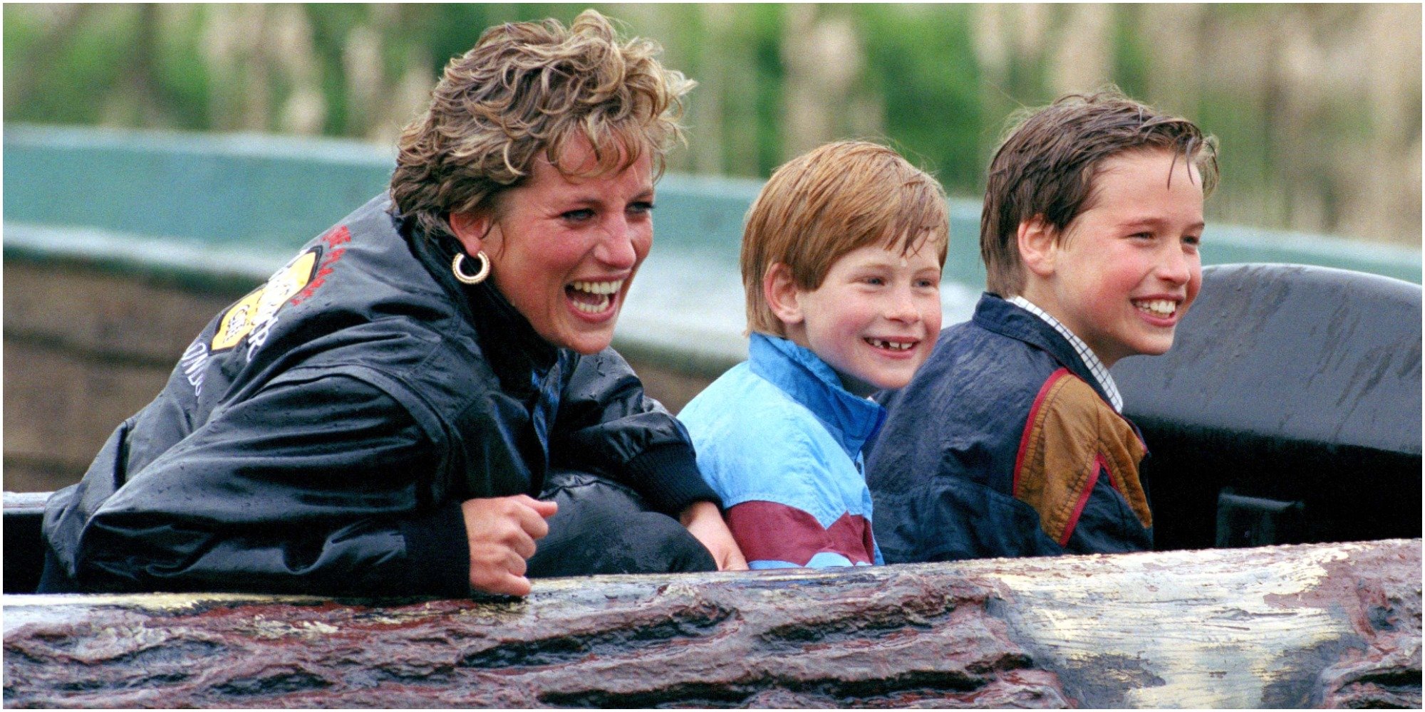 Princess Diana, Prince Harry and Prince William on a ride in a United Kingdom amusement park.
