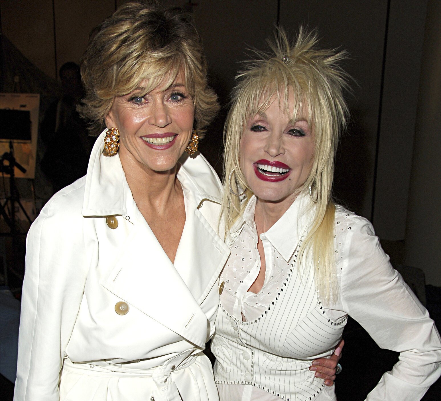 Jane Fonda and Dolly Parton pose next to each other for the '9 to 5's 25th anniversary.