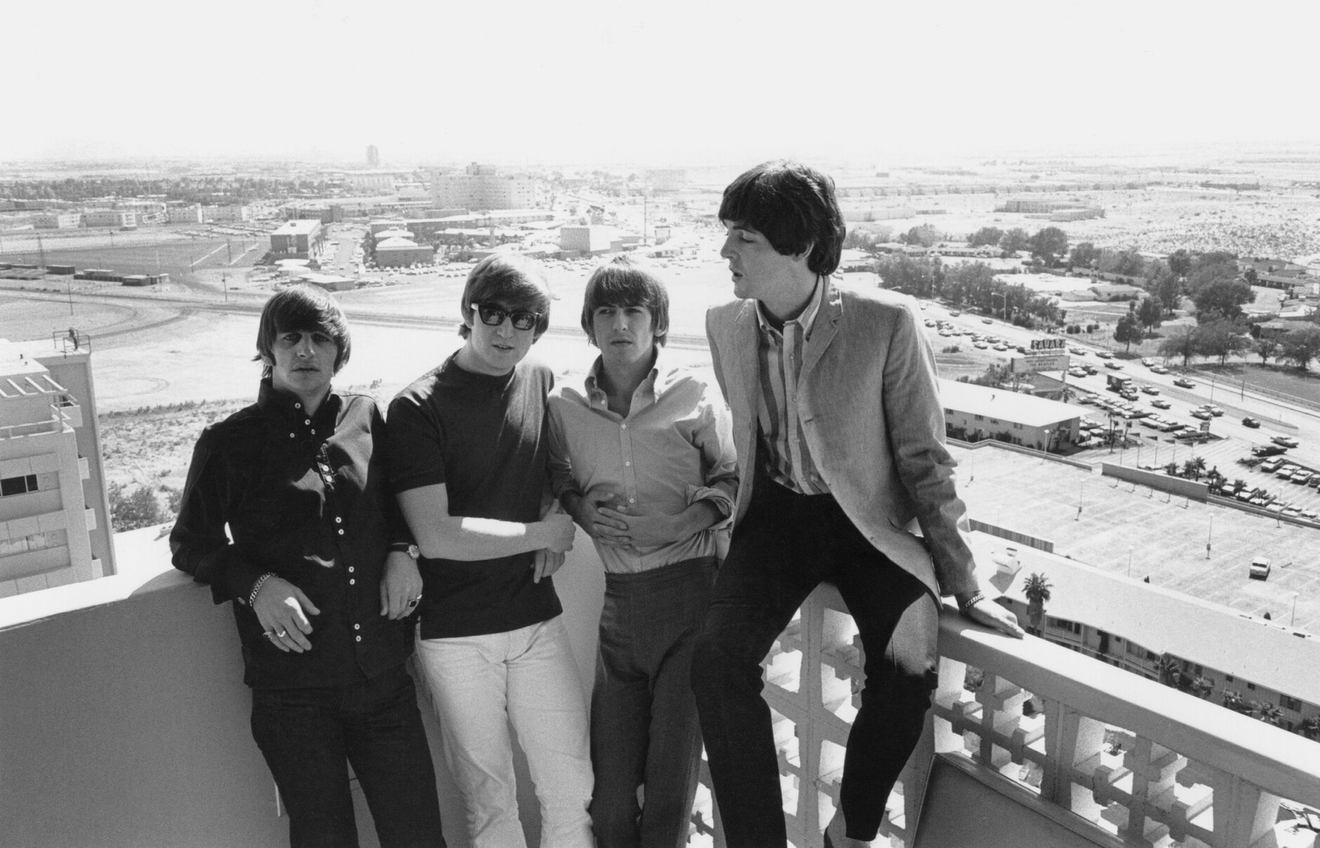 The Beatles on a hotel balcony during their tour of America in 1964.