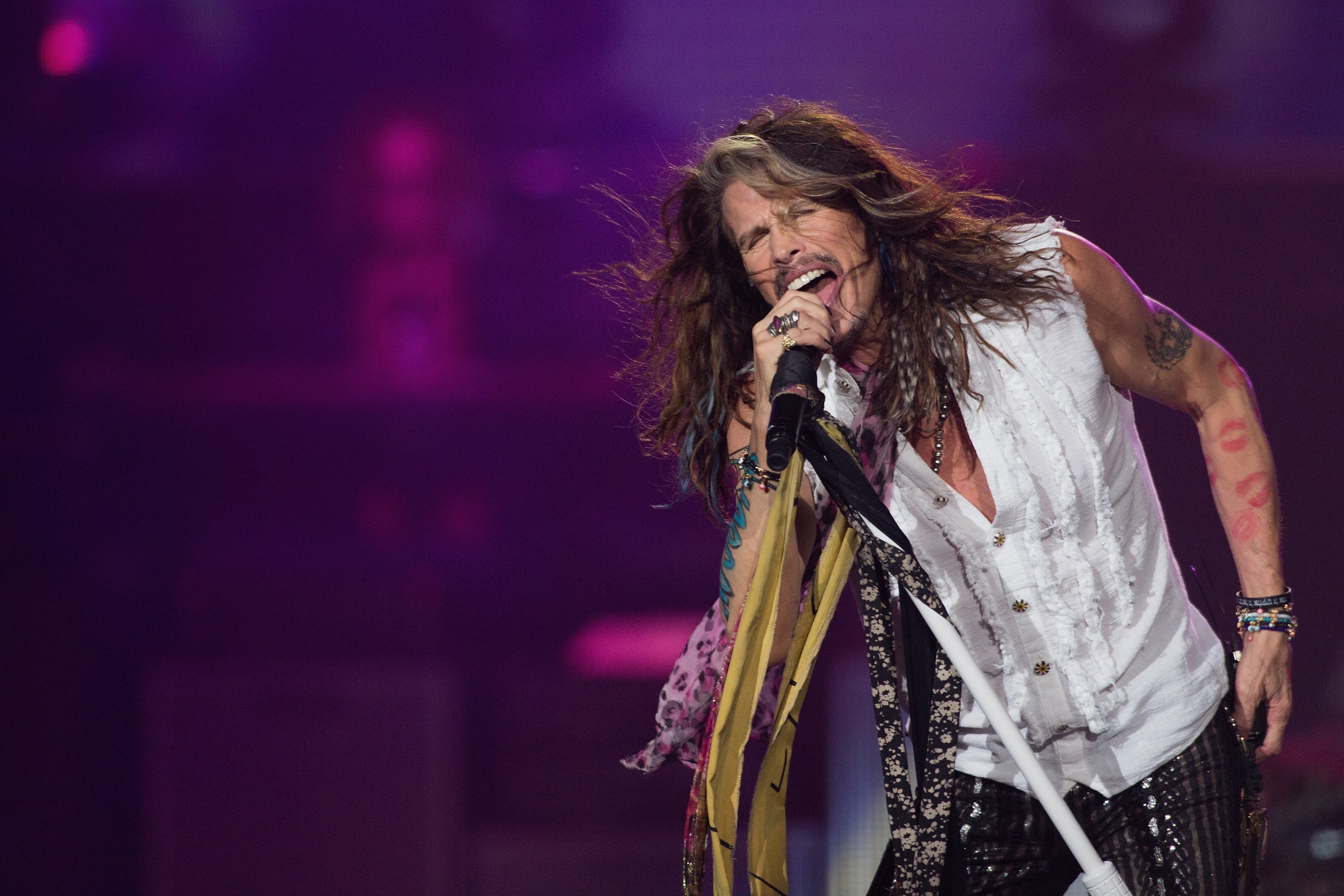 Steven Tyler performs at a concert