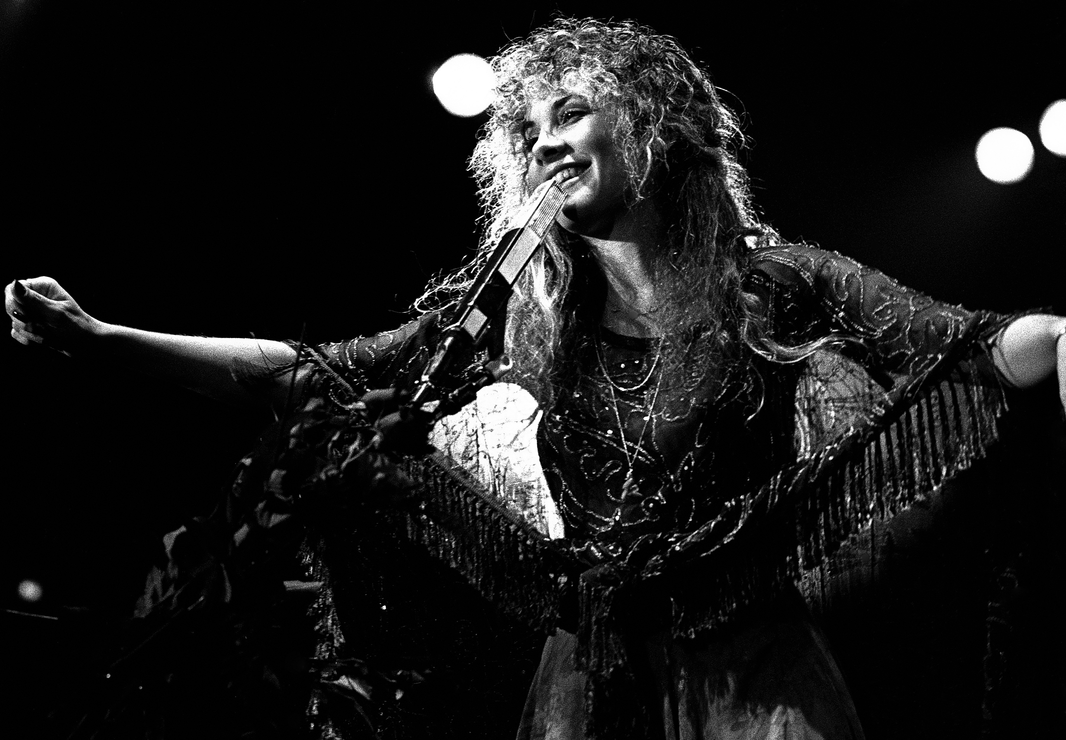 Fleetwood Mac's Stevie Nicks in front of a microphone