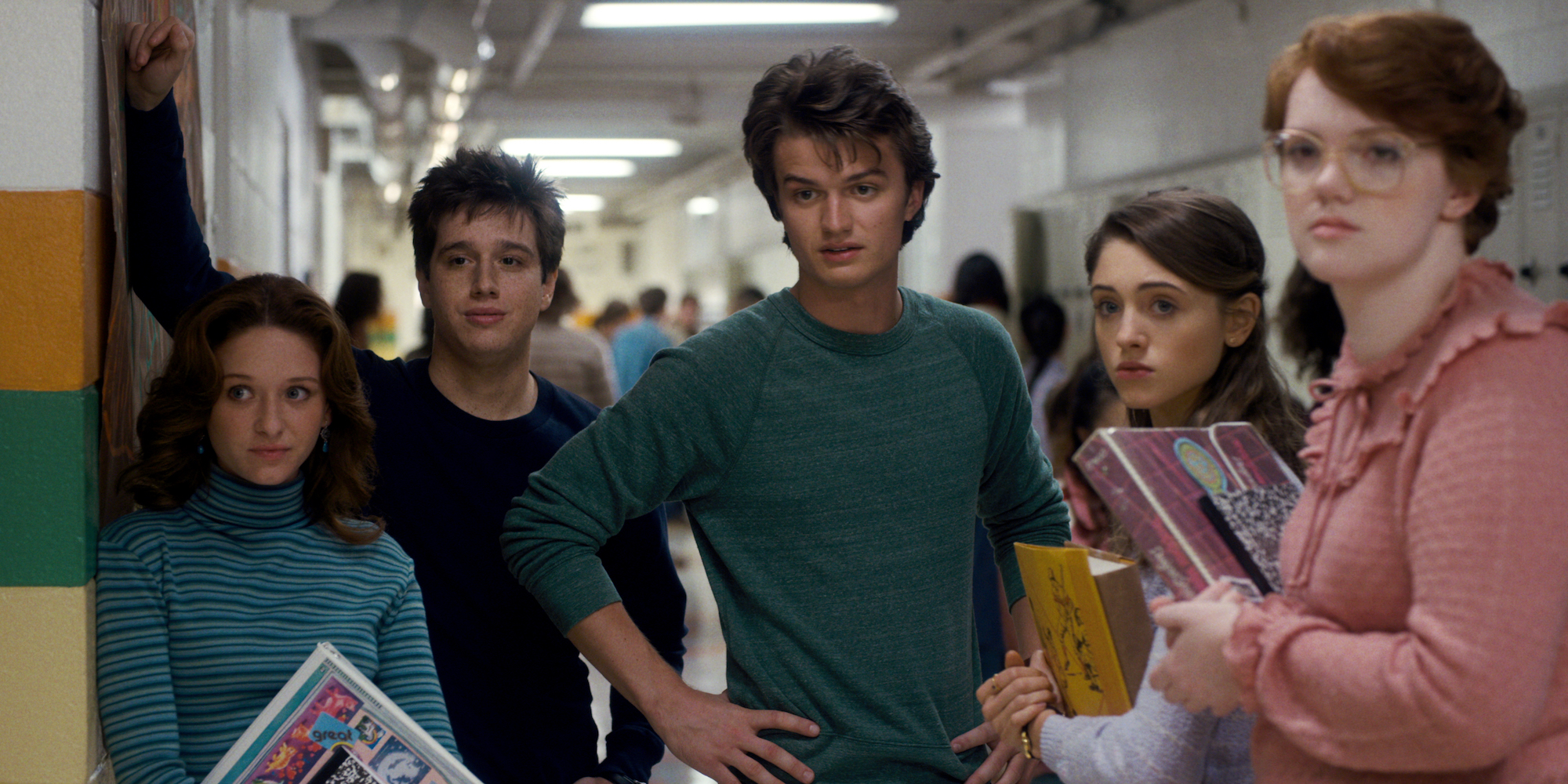 A production still of Tommy, Carol, Steve, and Nancy in Stranger Things Season 1