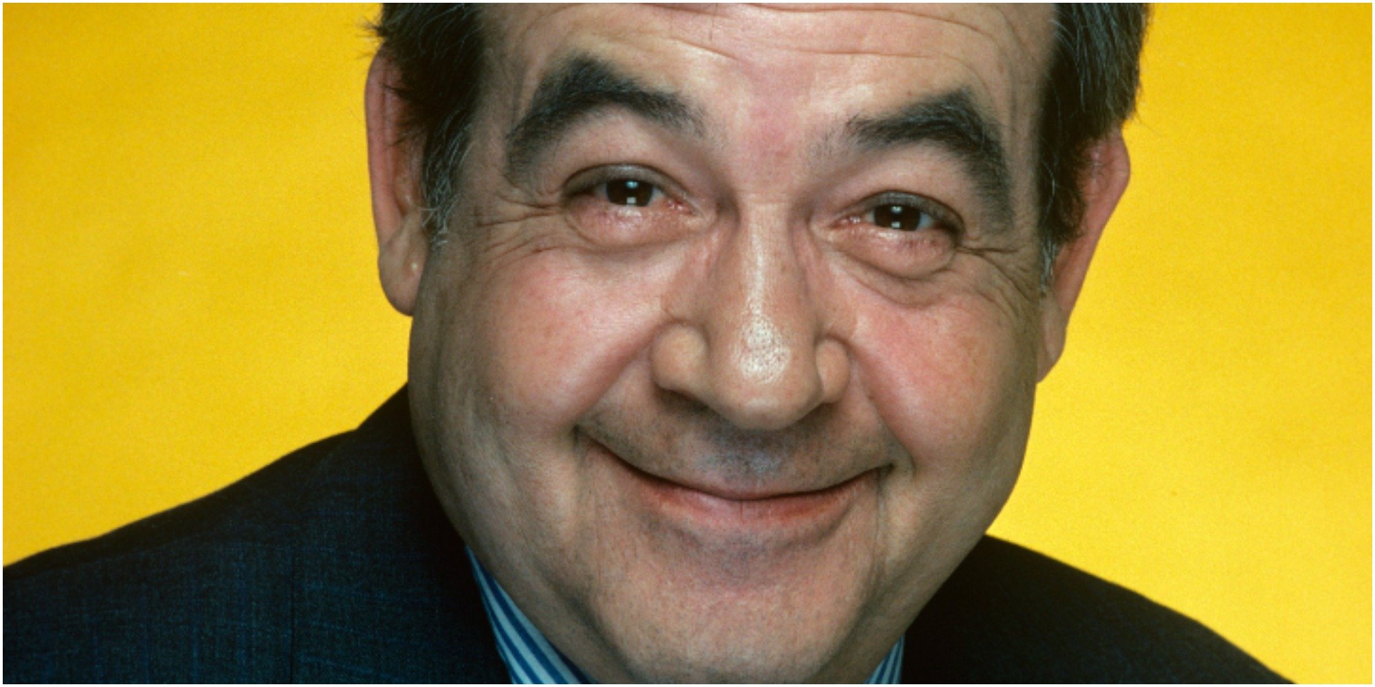 Tom Bosley played Howard Cunningham on Happy Days.