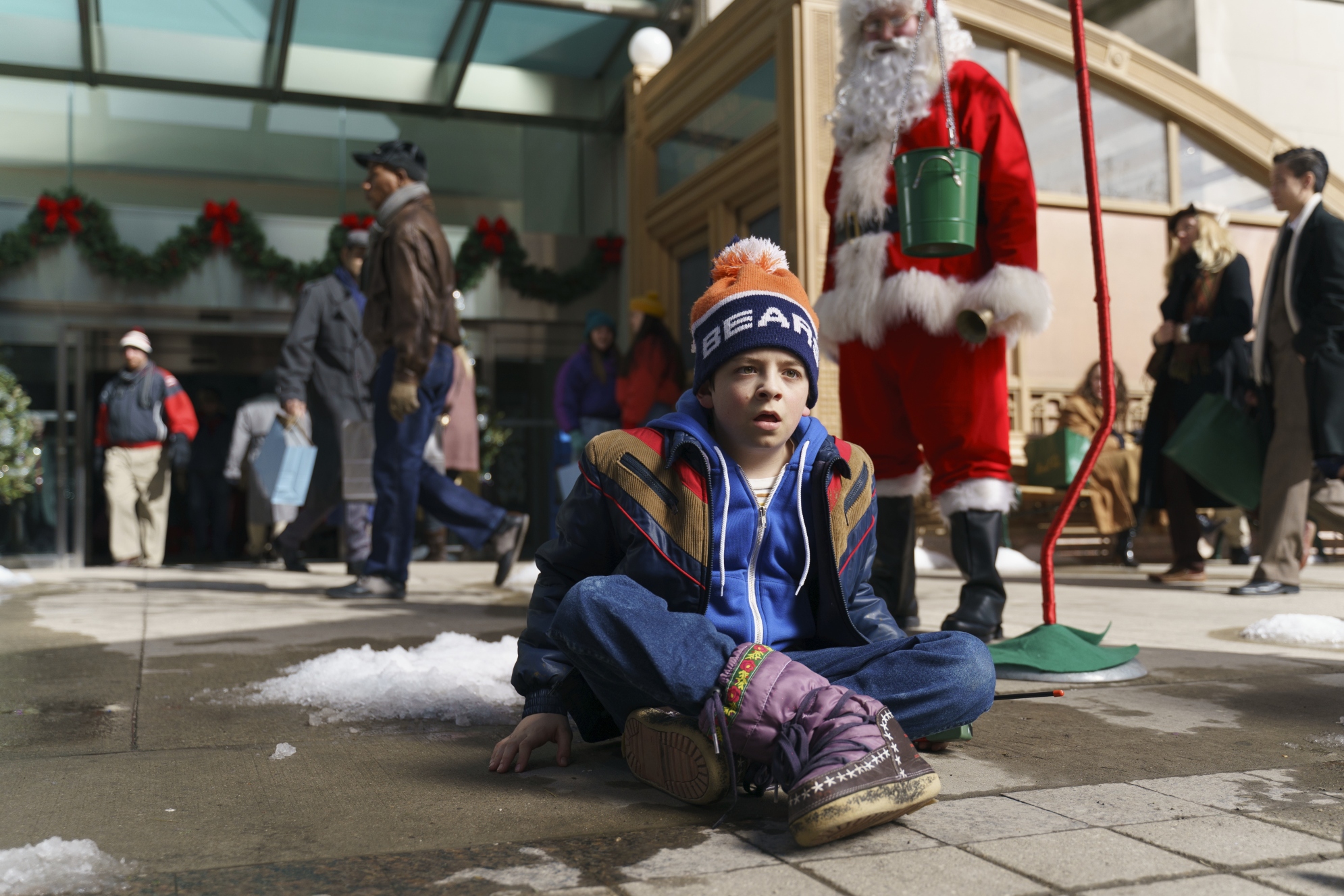 Jake sitting on ice in '8-Bit Christmas'