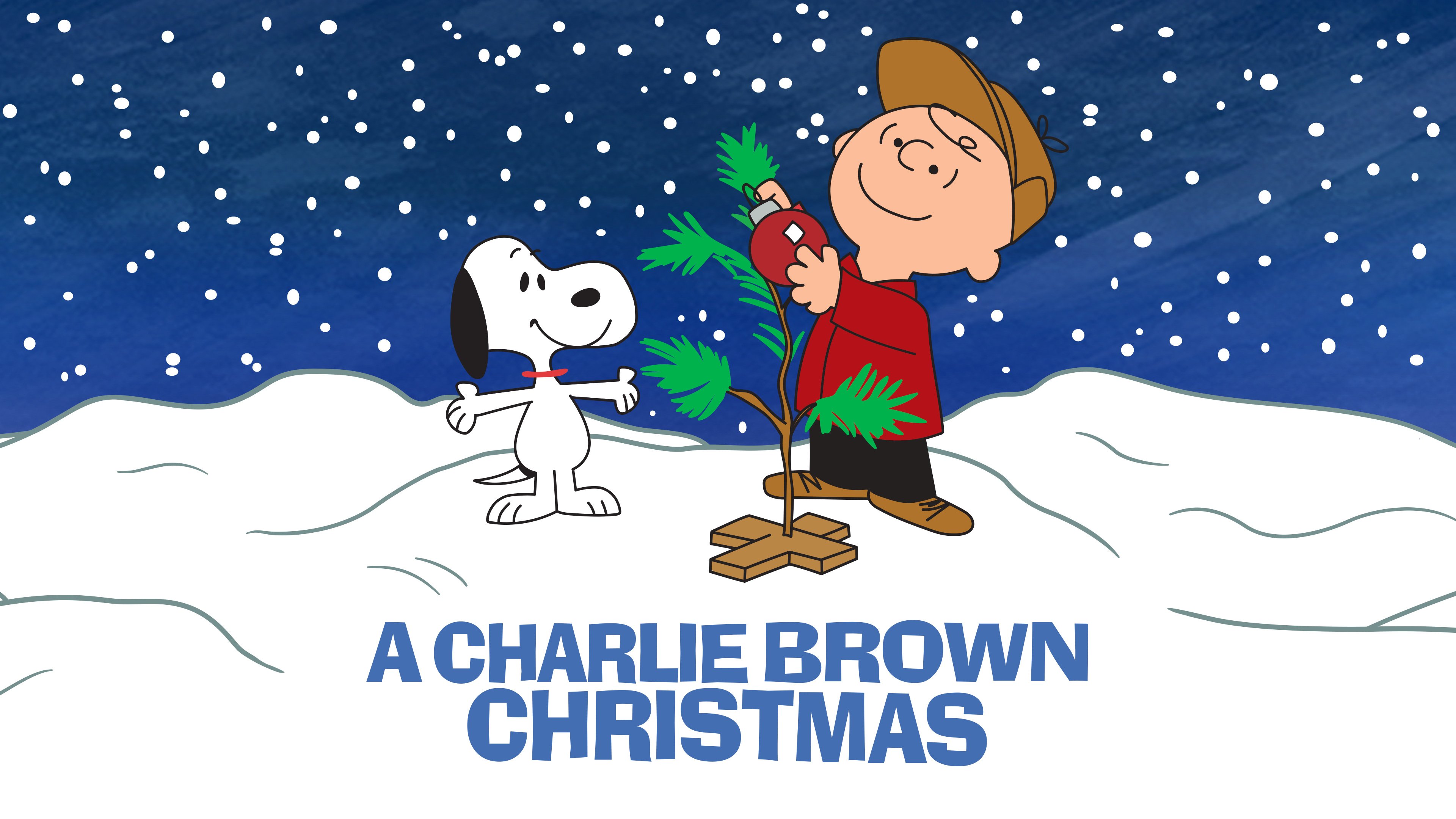 Snoopy and Charlie Brown with sad Christmas tree in promotional image for 'A Charlie Brown Christmas'