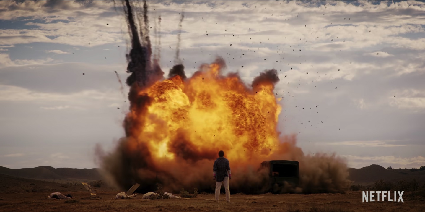 Mystery person standing in front of an explosion in Stranger Things Season 4 California teaser