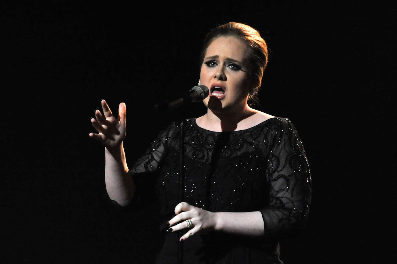 Adele wearing black while performing at the 2011 BRIT Awards in London.