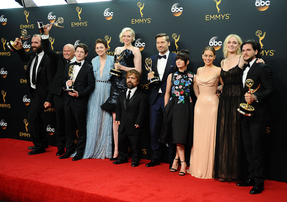 Rory McCann, Conleth Hill, Iwan Rheon, Gwendoline Christie, Peter Dinklage, Nikolaj Coster-Waldau, Maisie Williams, Emilia Clarke, Sophie Turner, and Kit Harington celebrates Game of Thrones' Emmy win