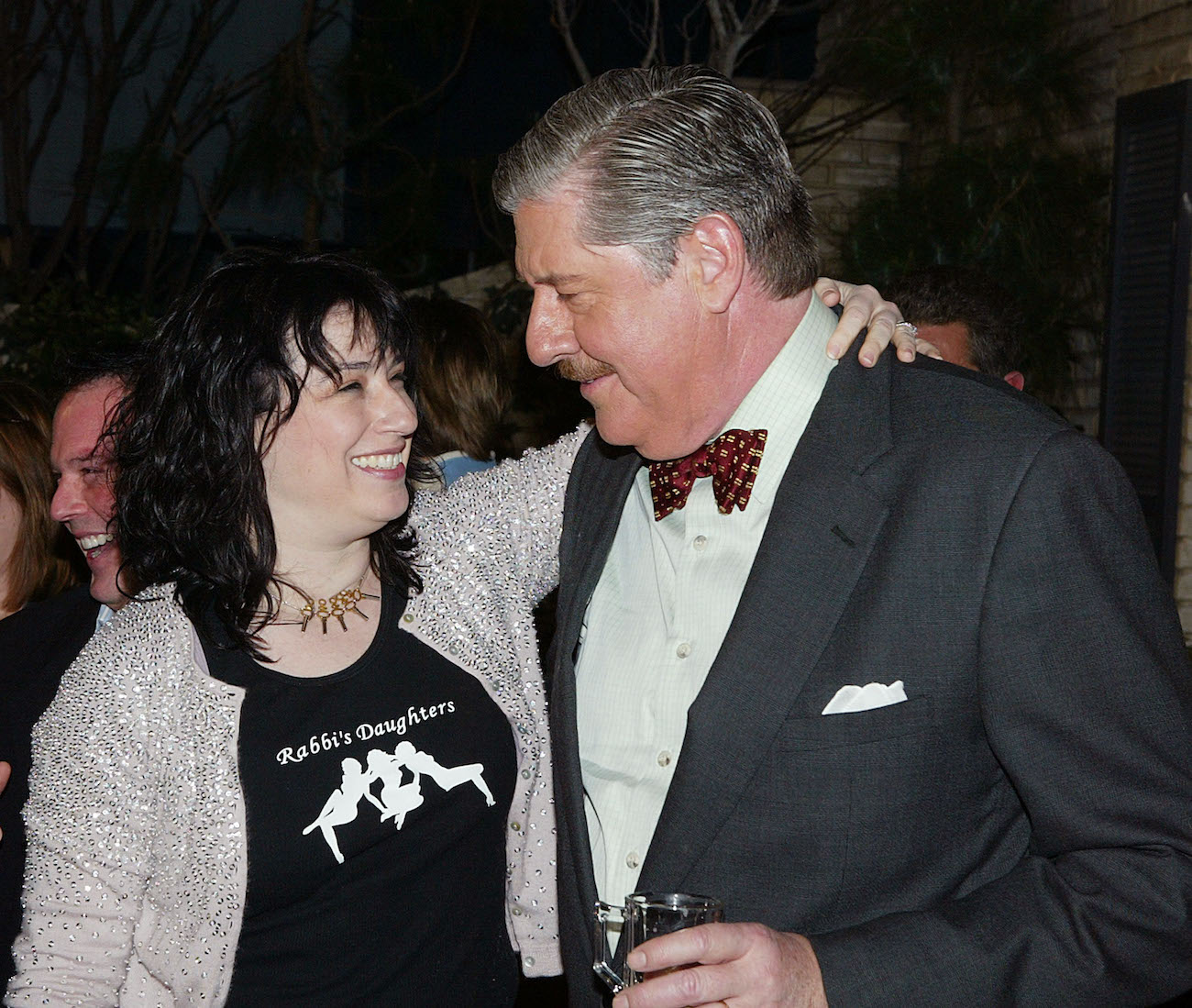 Amy Sherman-Palladino smiles with her arm around 'Gilmore Girls' actor Edward Herrmann