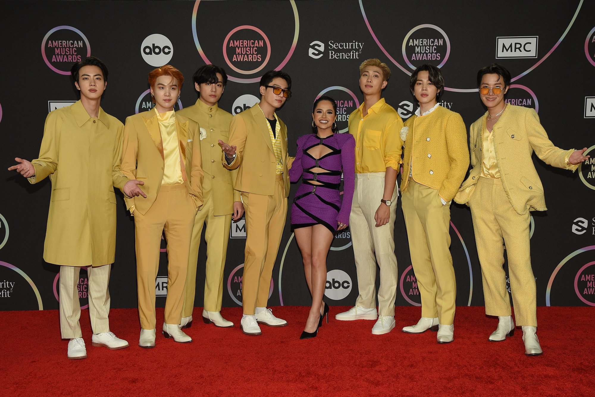 The members of BTS and Becky G pose together at the 2021 American Music Awards