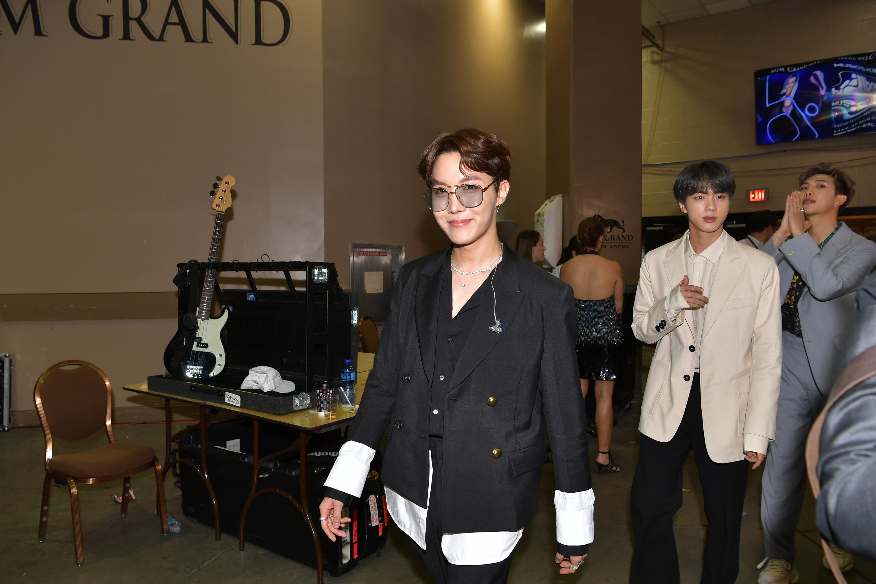 J-Hope of the boy band BTS is seen backstage during the 2019 Billboard Music Awards in black suit