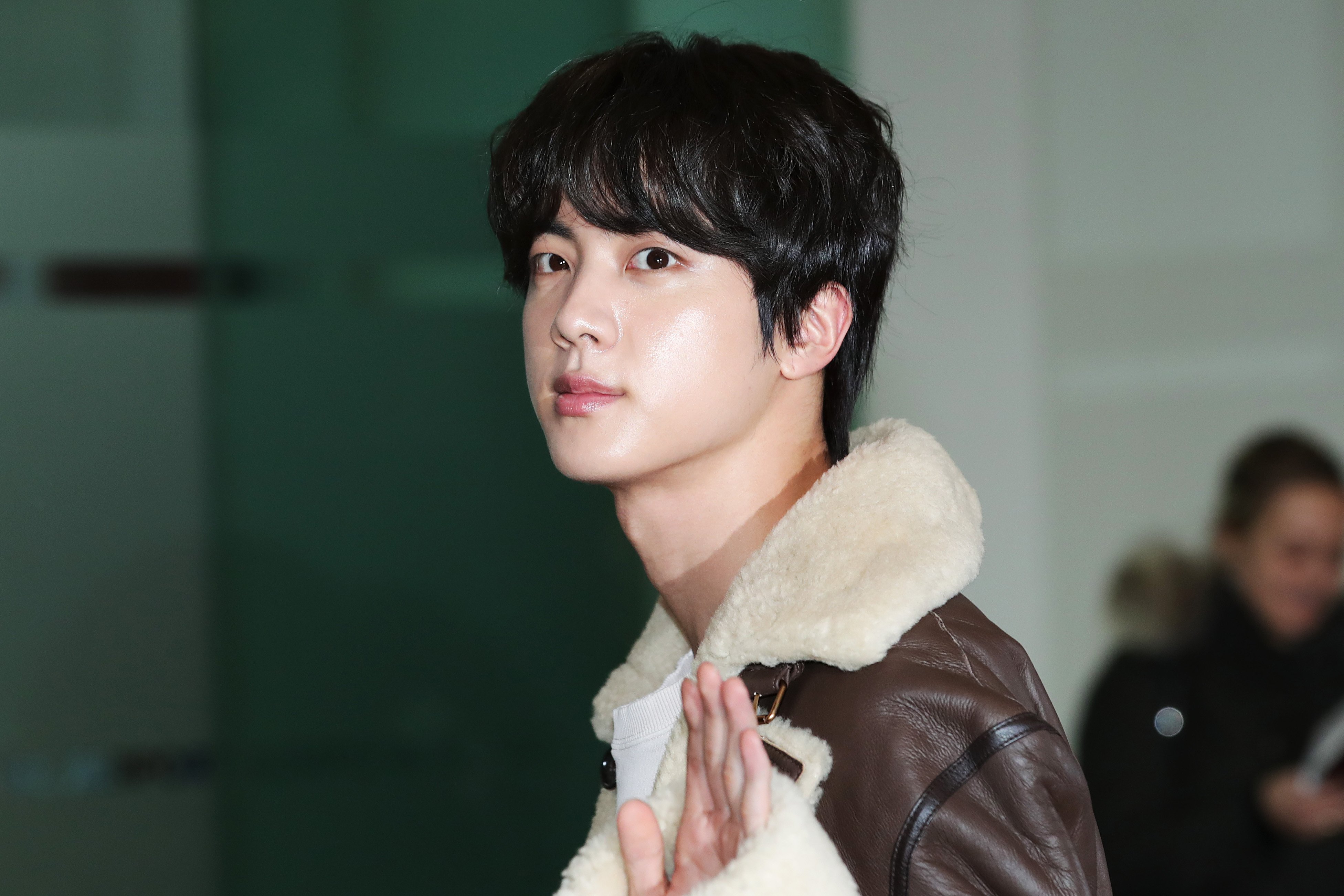 Jin of boy band BTS is seen on departure at Gimpo International Airport