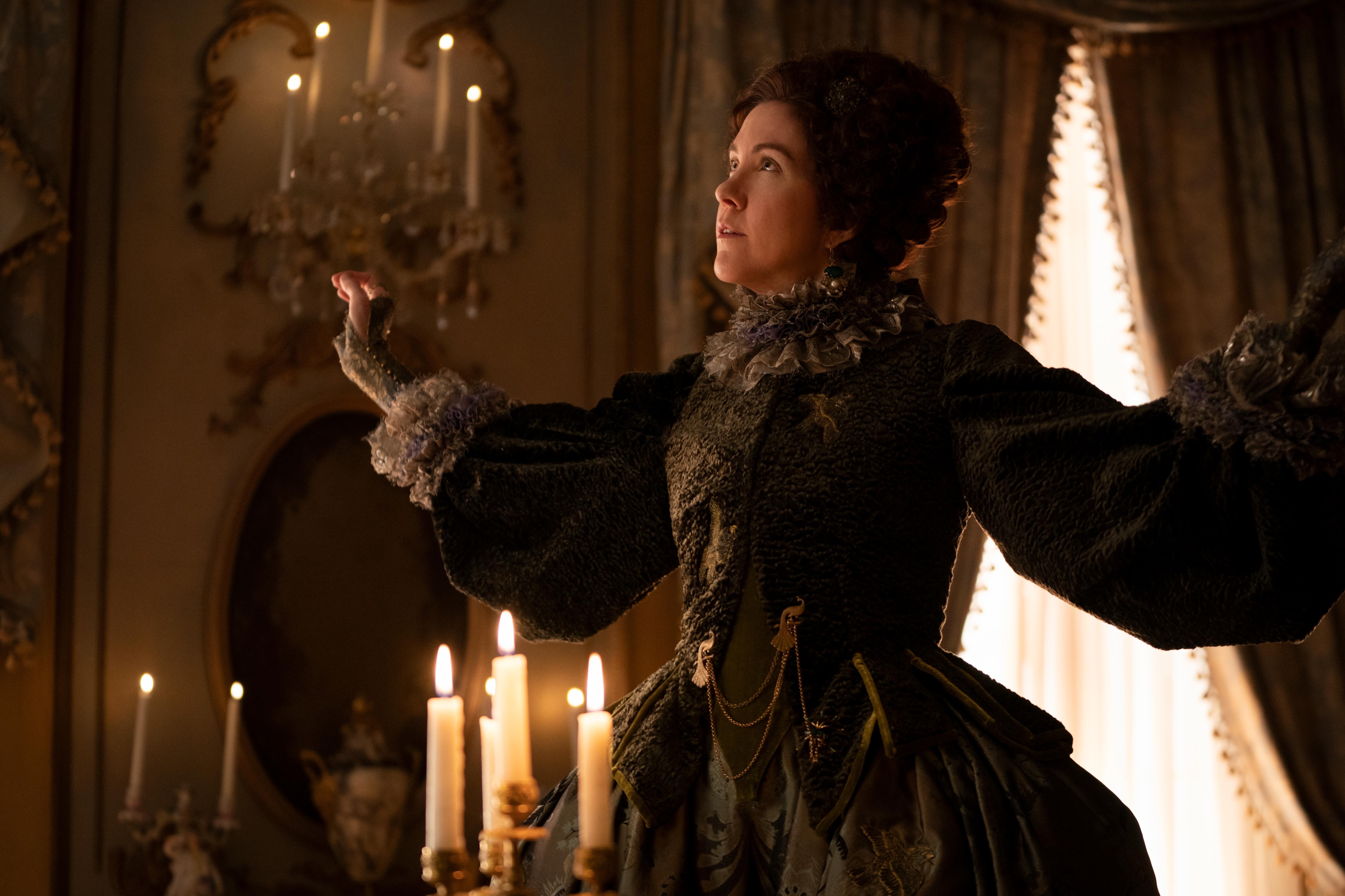 Belinda Bromilow as Aunt Elizabeth with her arms spread in 'The Great' Season 2