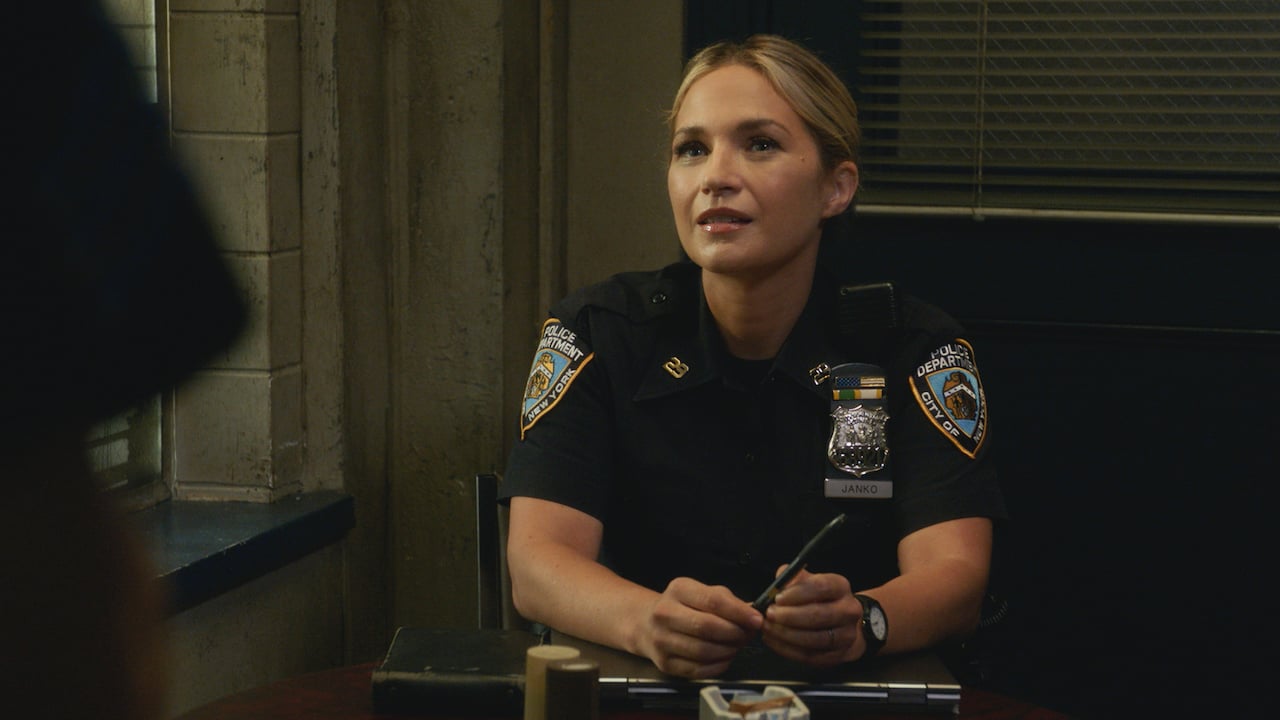 Vanessa Ray as Eddie Janko on 'Blue Bloods' sits in her police uniform.