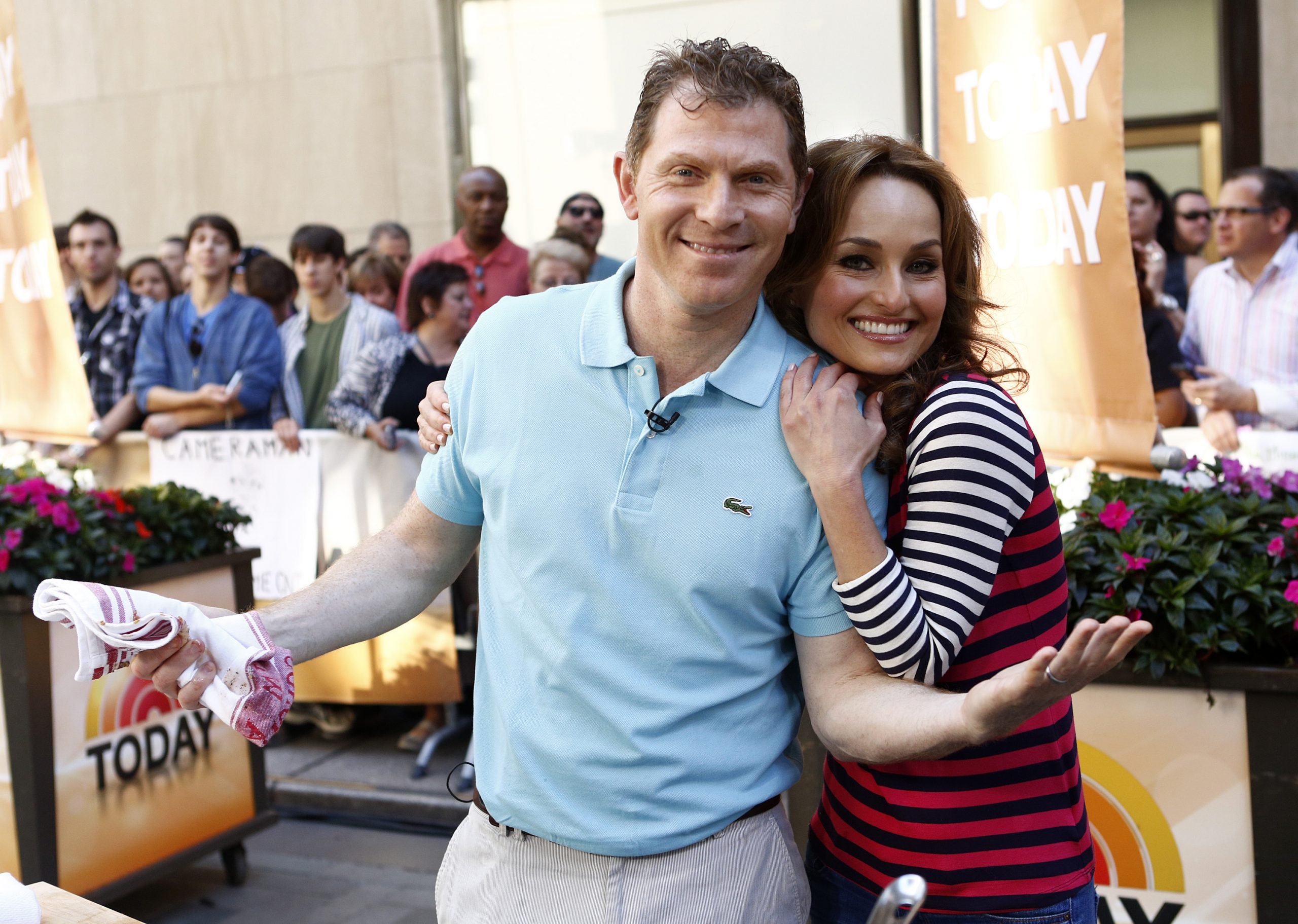 Food Network stars Bobby Flay and Giada De Laurentiis pose for a photo on the 'Today' set, 2012.